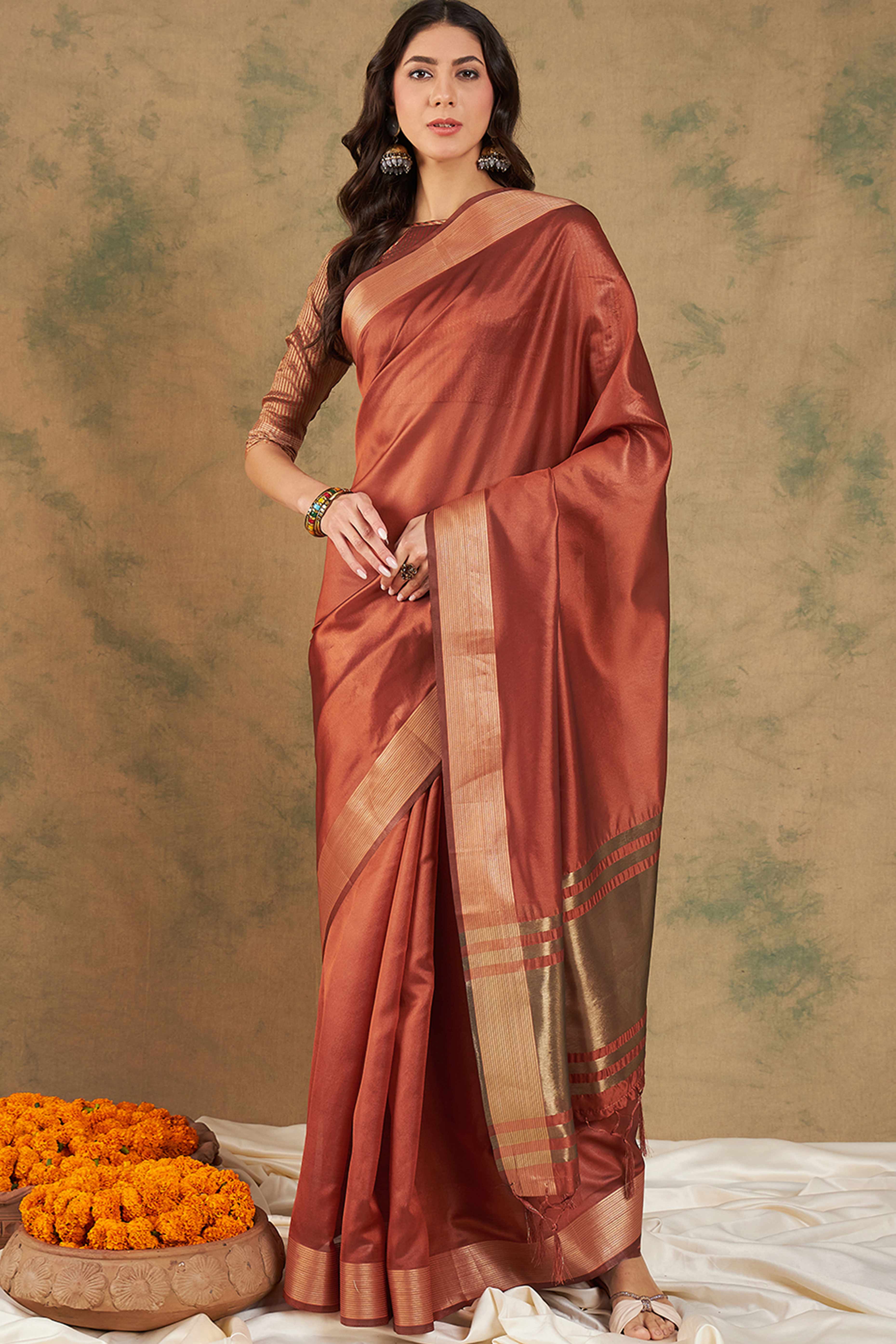Rust Organza Saree In Organza With Delicate Weaving Border And Tassel Details