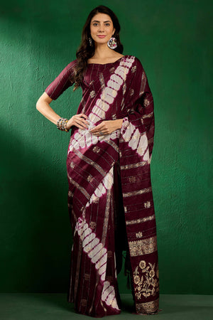 Wine Floral Woven Staple Cotton Blend Saree Highlighted With Sequins Embroidery & Tasselled Pallu
