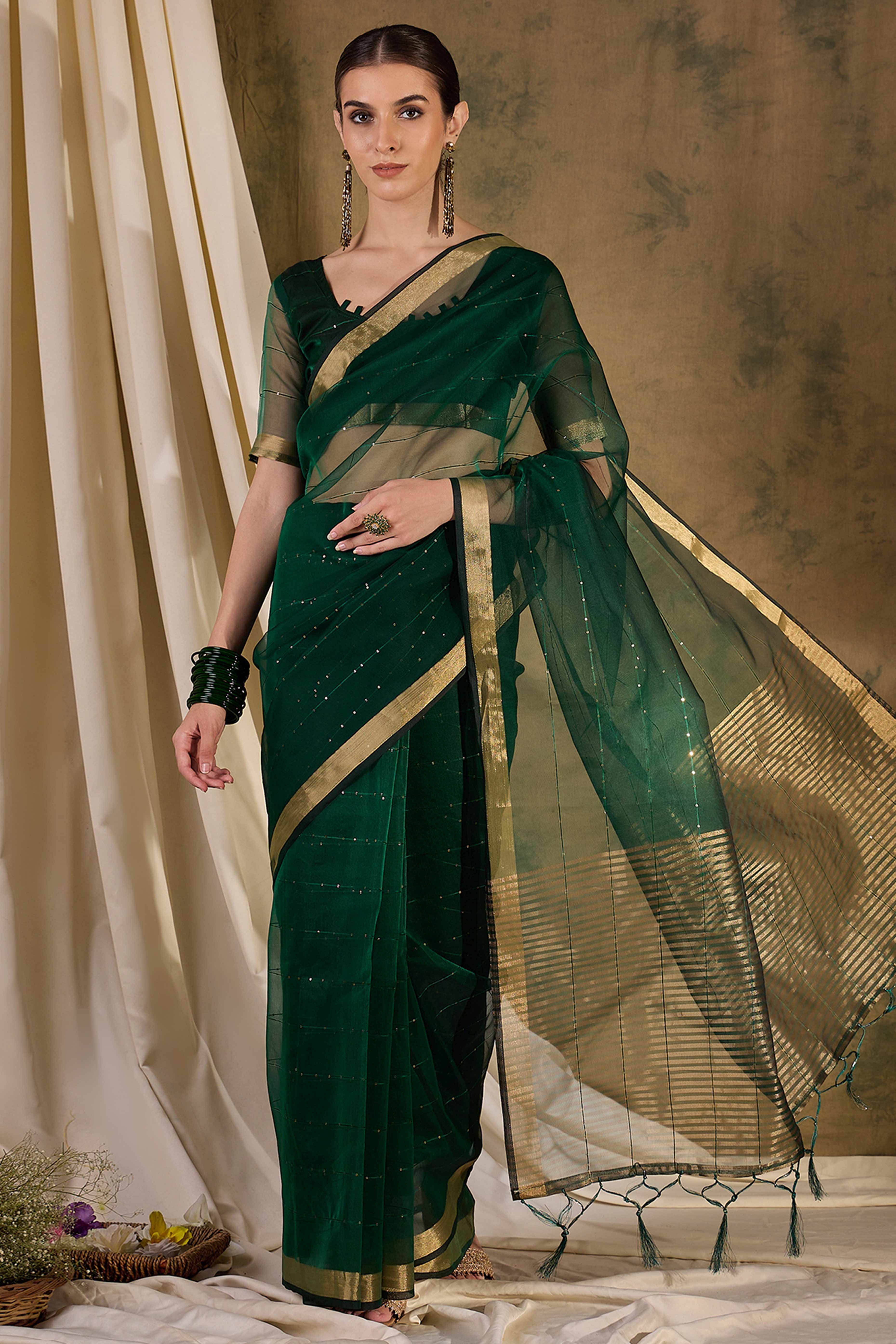 Green Organza Silk Saree Featuring Shimmering Sequins Embroidery & Elegant Tasselled Pallu