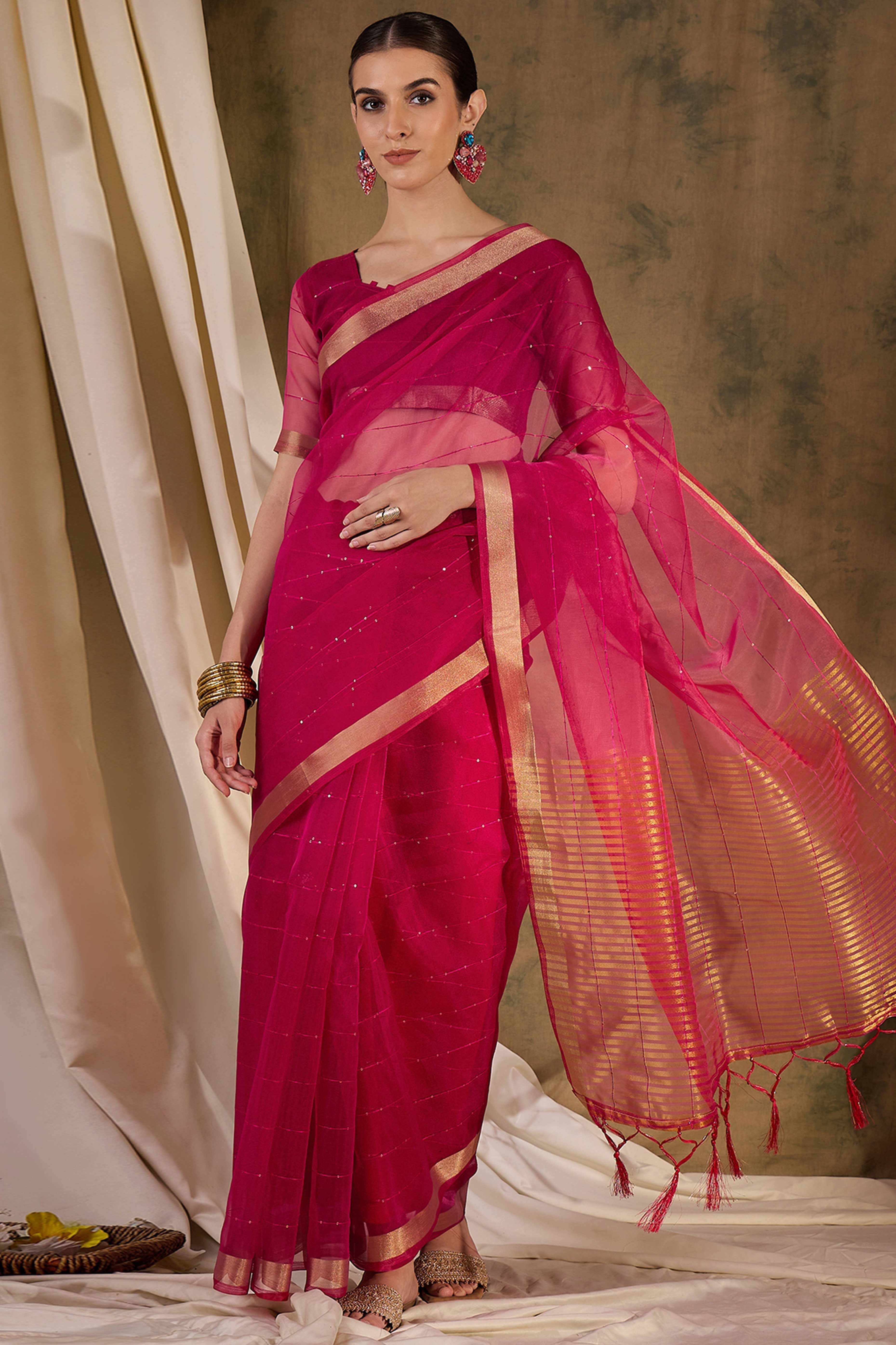 Pink Organza Silk Saree Featuring Shimmering Sequins Embroidery & Elegant Tasselled Pallu