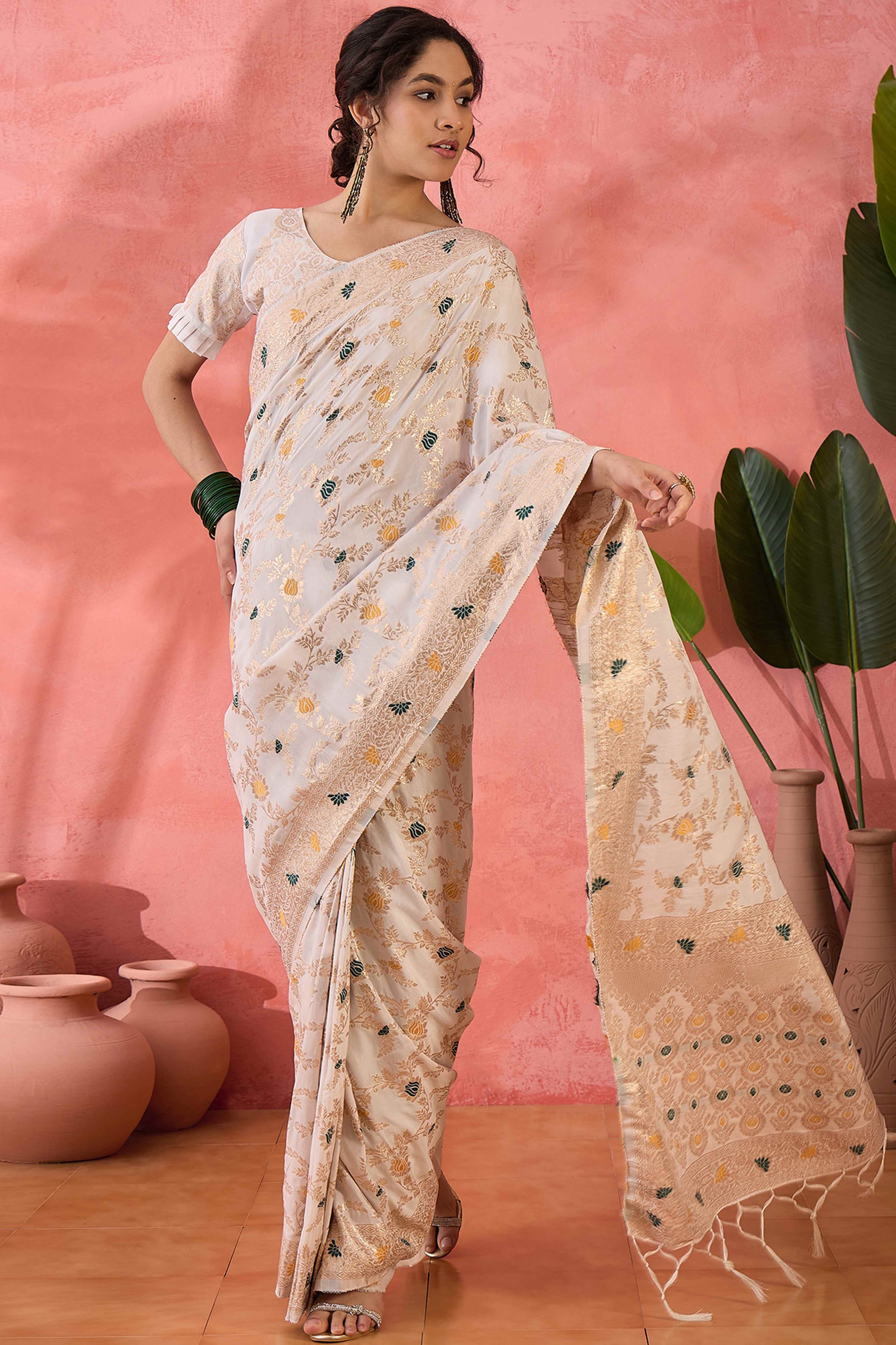 Offwhite Cotton Meena Jacquard Saree Featuring Intricate Floral Weaving & Tassels On The Pallu