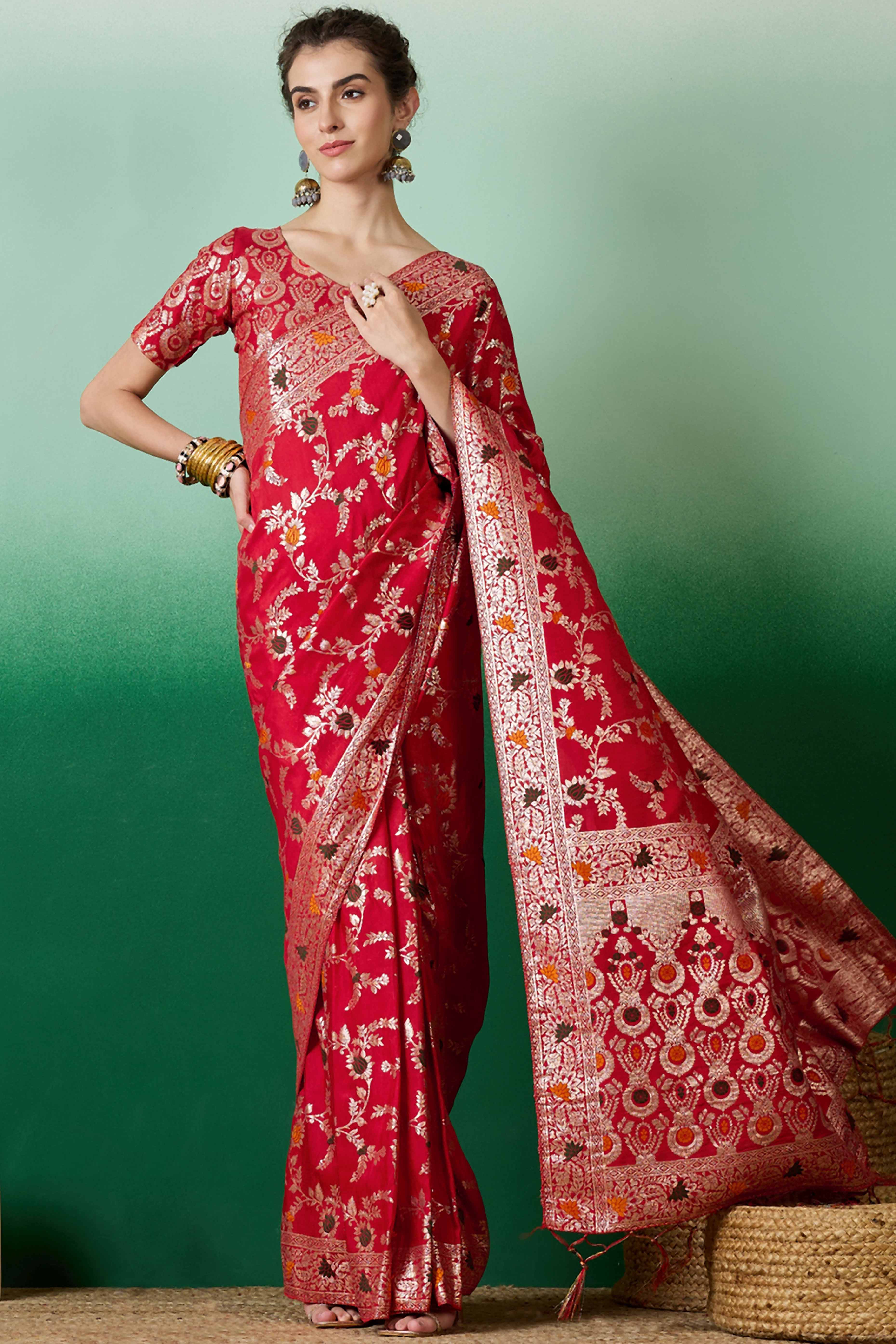 Red Cotton Meena jacquard Saree Featuring Intricate Floral Weaving & Playful Tassels On The Pallu