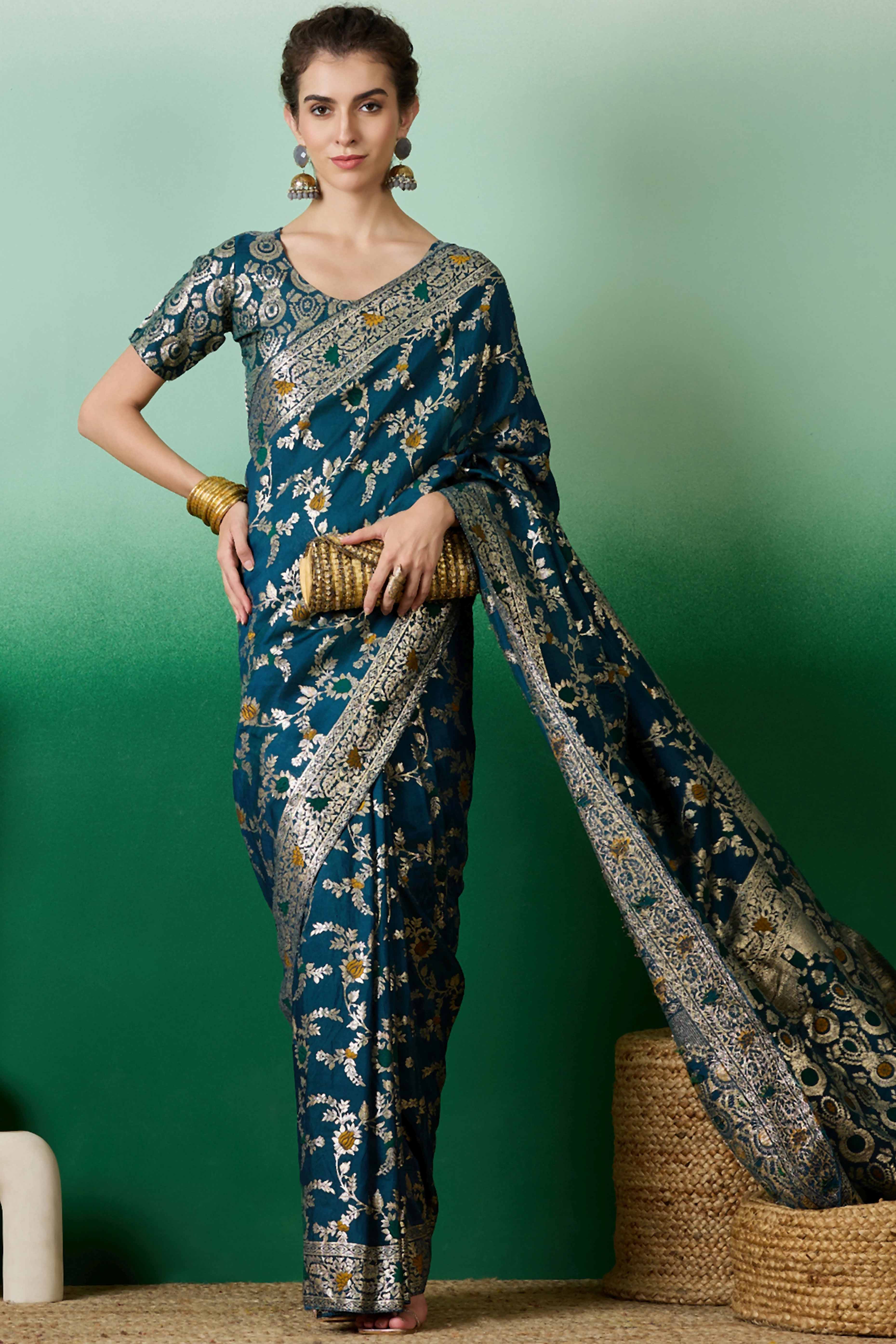Teal Cotton Meena jacquard Saree Featuring Intricate Floral Weaving & Tassels On The Pallu