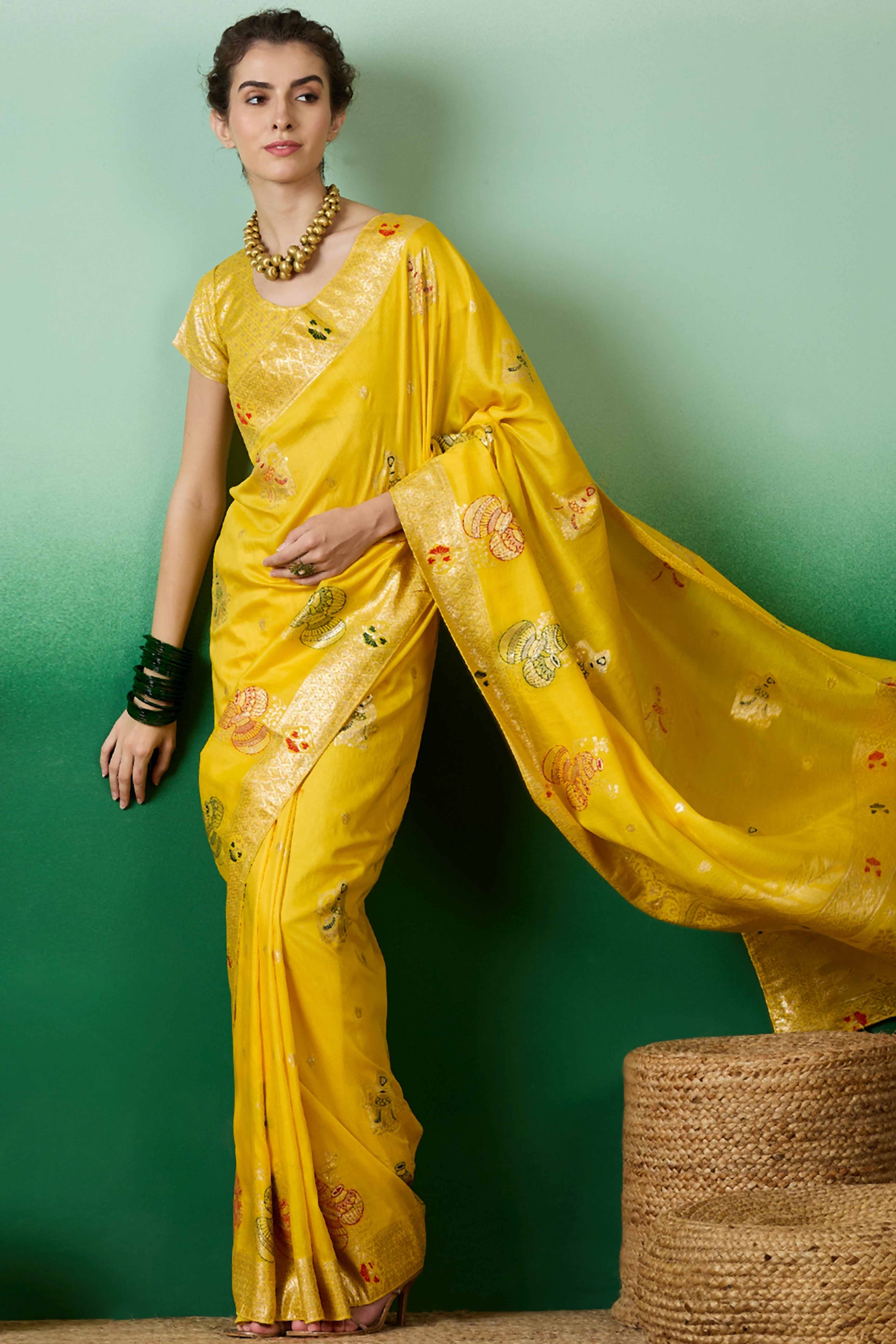 Yellow Cotton Blend Saree Adorned With Floral Zari Weaving & Soft Tassel Accents