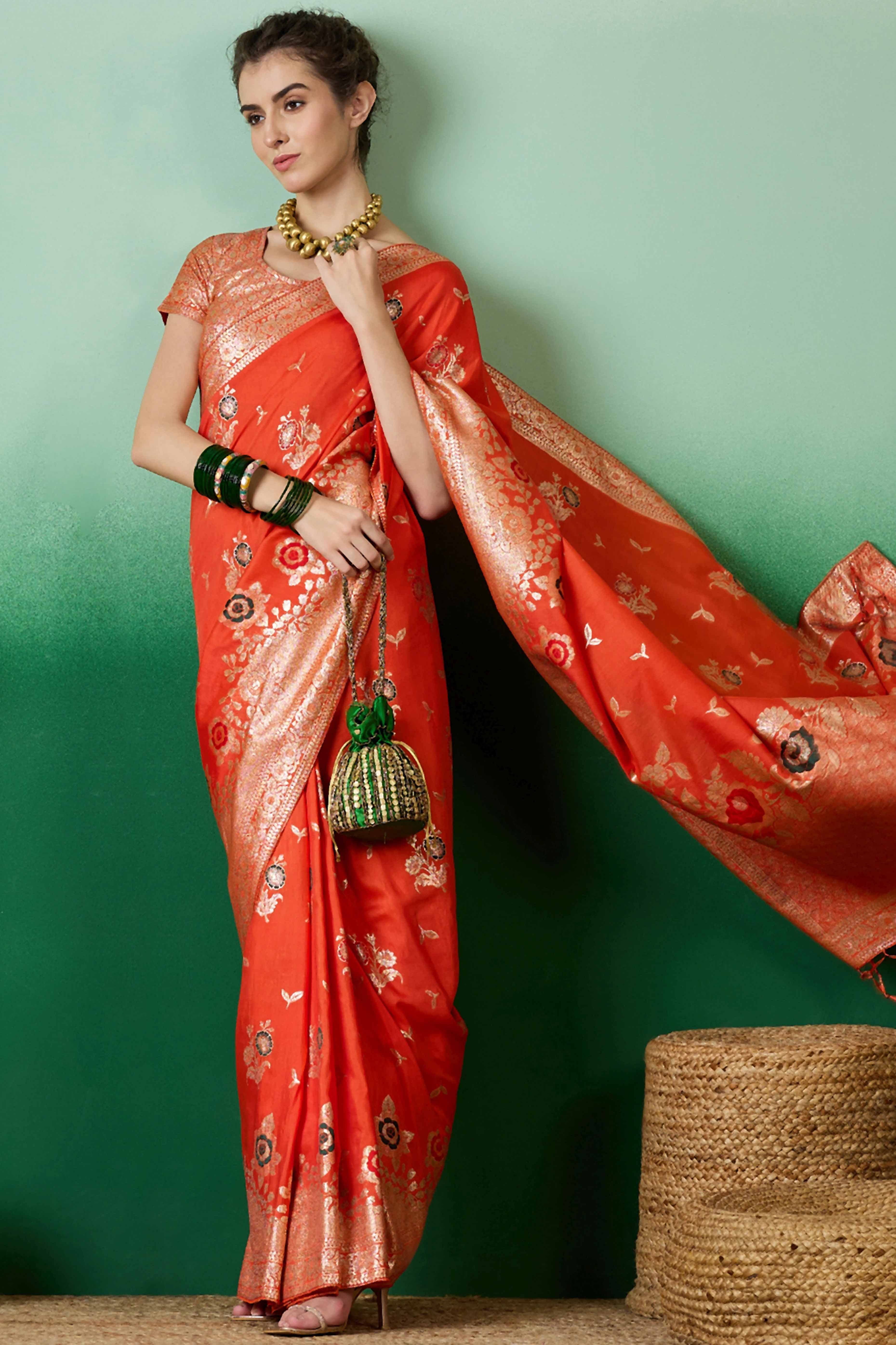 Orange Cotton Blend Saree Embellished With Floral Zari Weaving & Tasselled Pallu