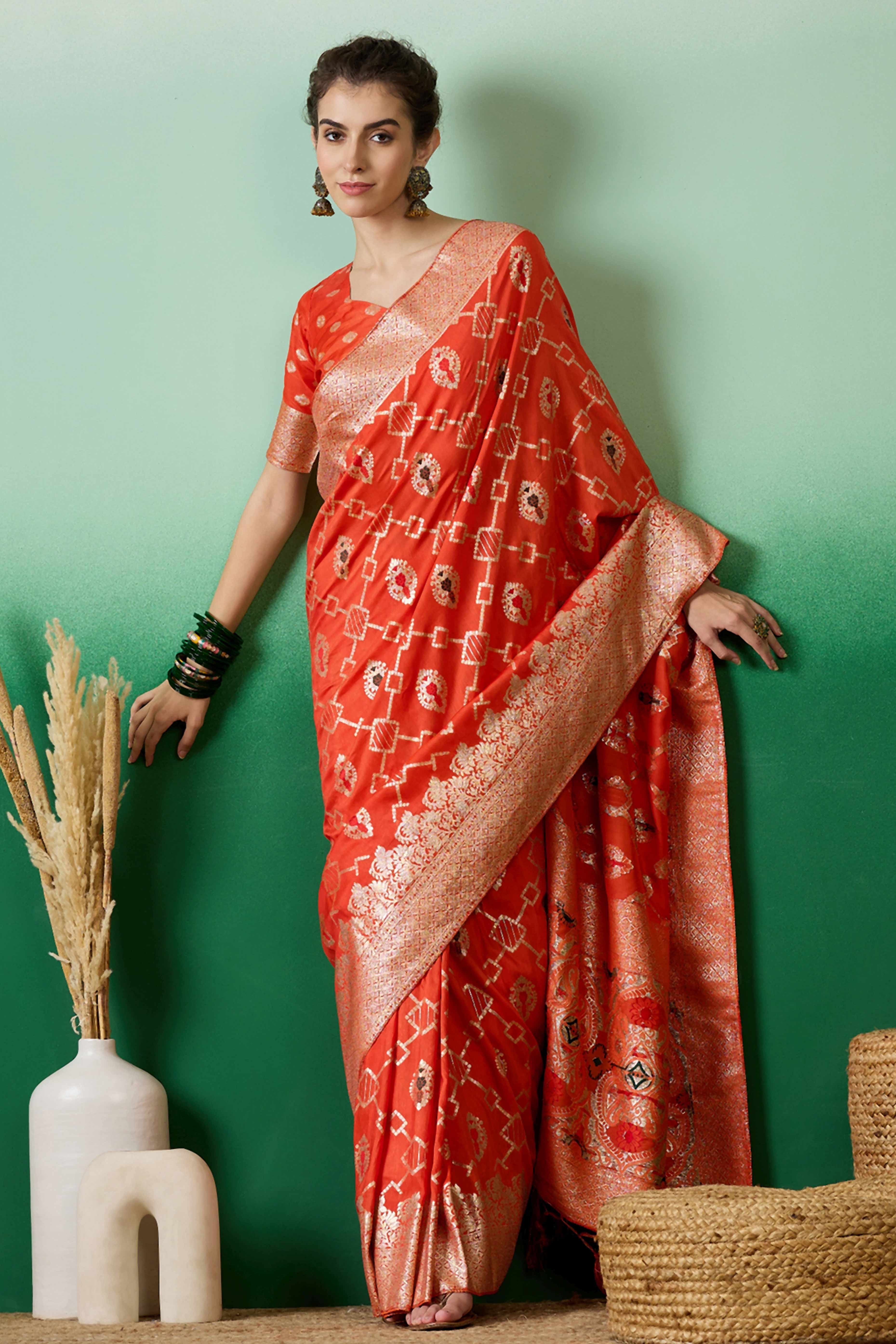 Orange Zari Woven Staple Cotton Blend Saree With Floral Motifs & Tassel Detailed Pallu