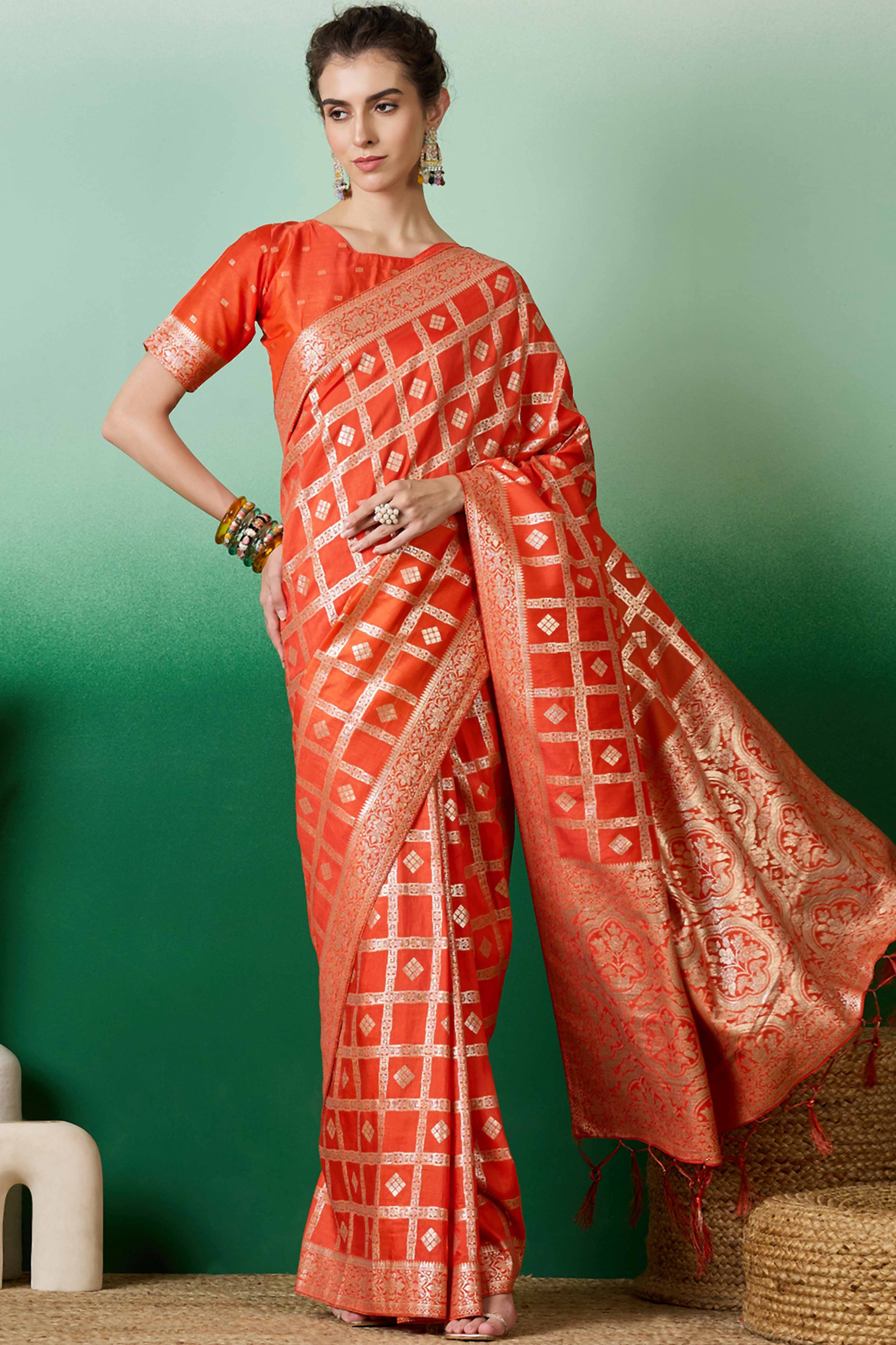 Orange Jacquard Saree In Cotton Blend Featuring Elegant Floral Weaving & A Tasselled Pallu