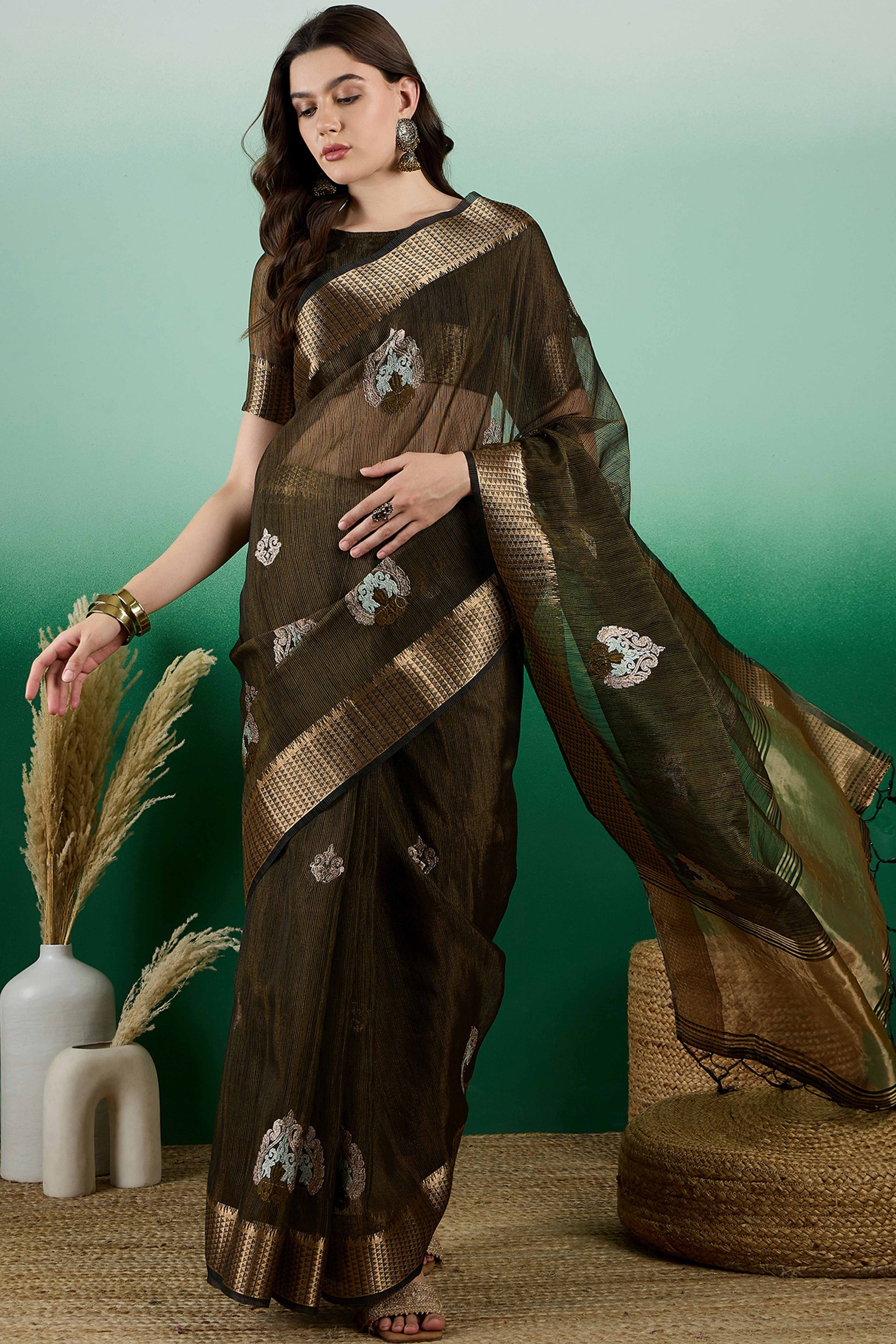 Mehendi Green Khadi Organza Saree Adorned With Elegant Embroidery & Tassel Pallu