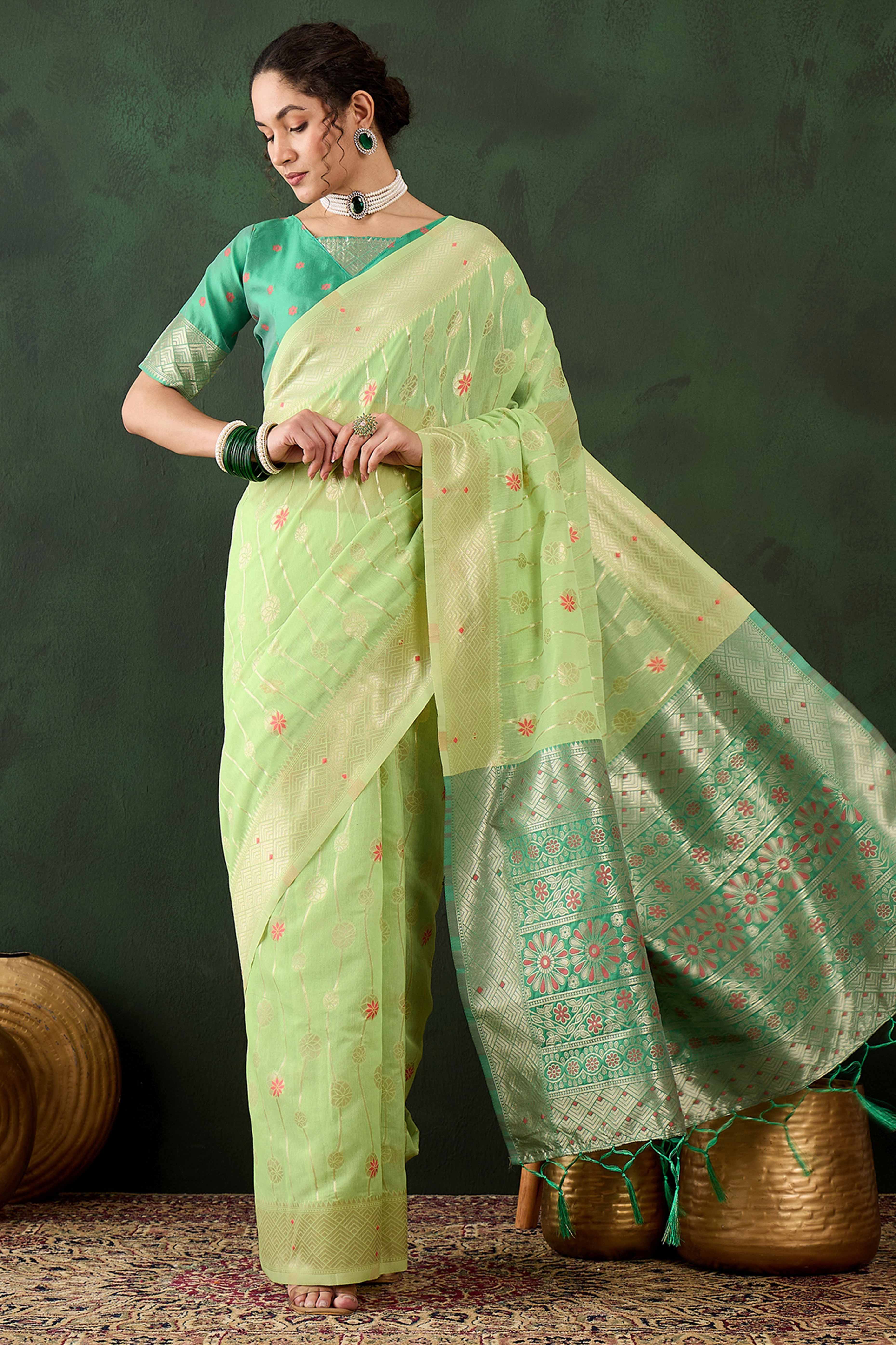 Green Cotton Blend Saree Adorned With Intricate Floral Zari Weaving & A Stylish Tassel Pallu