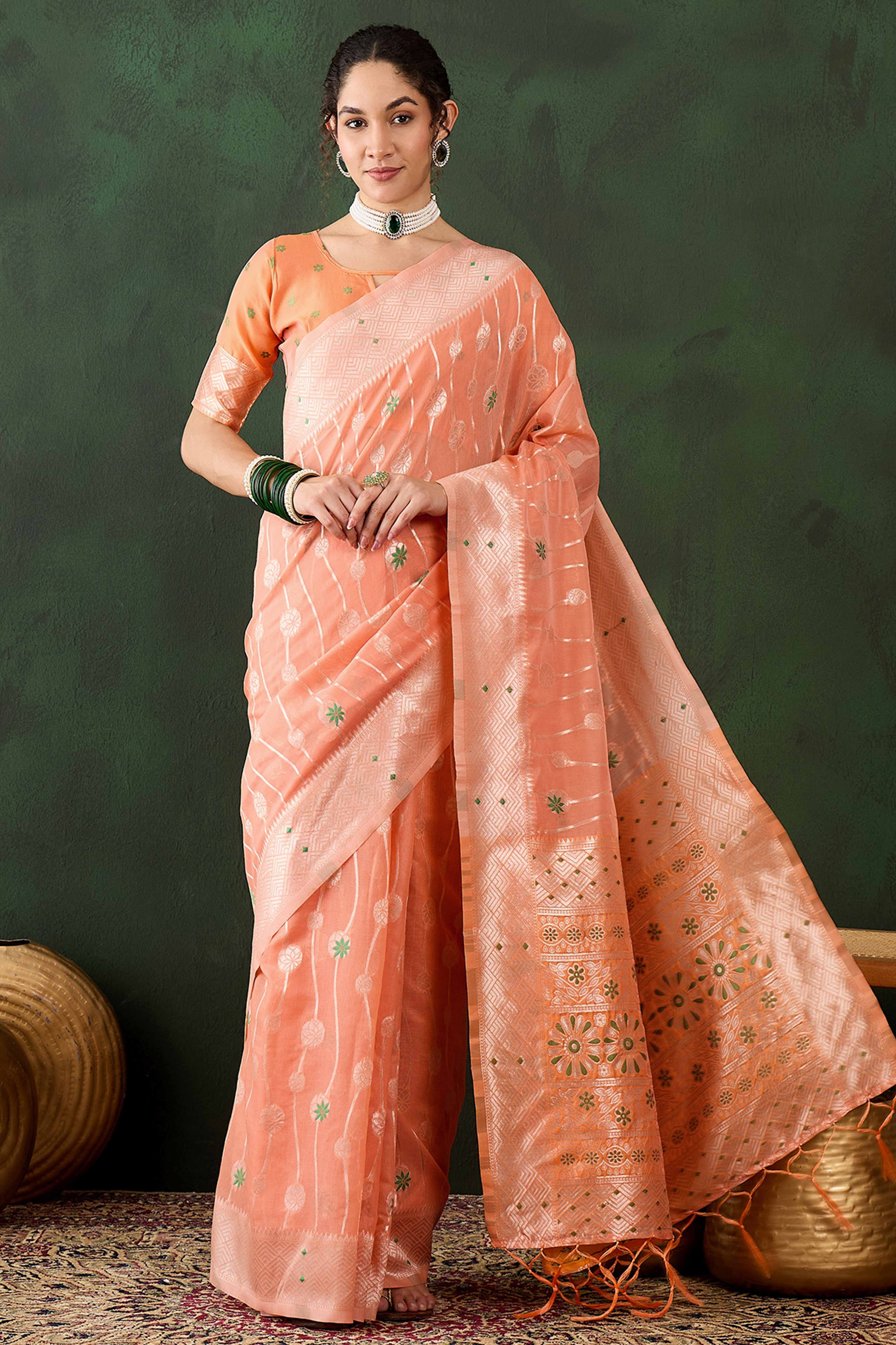 Orange Cotton Blend Saree Adorned With Intricate Floral Zari Weaving & A Stylish Tassel Pallu