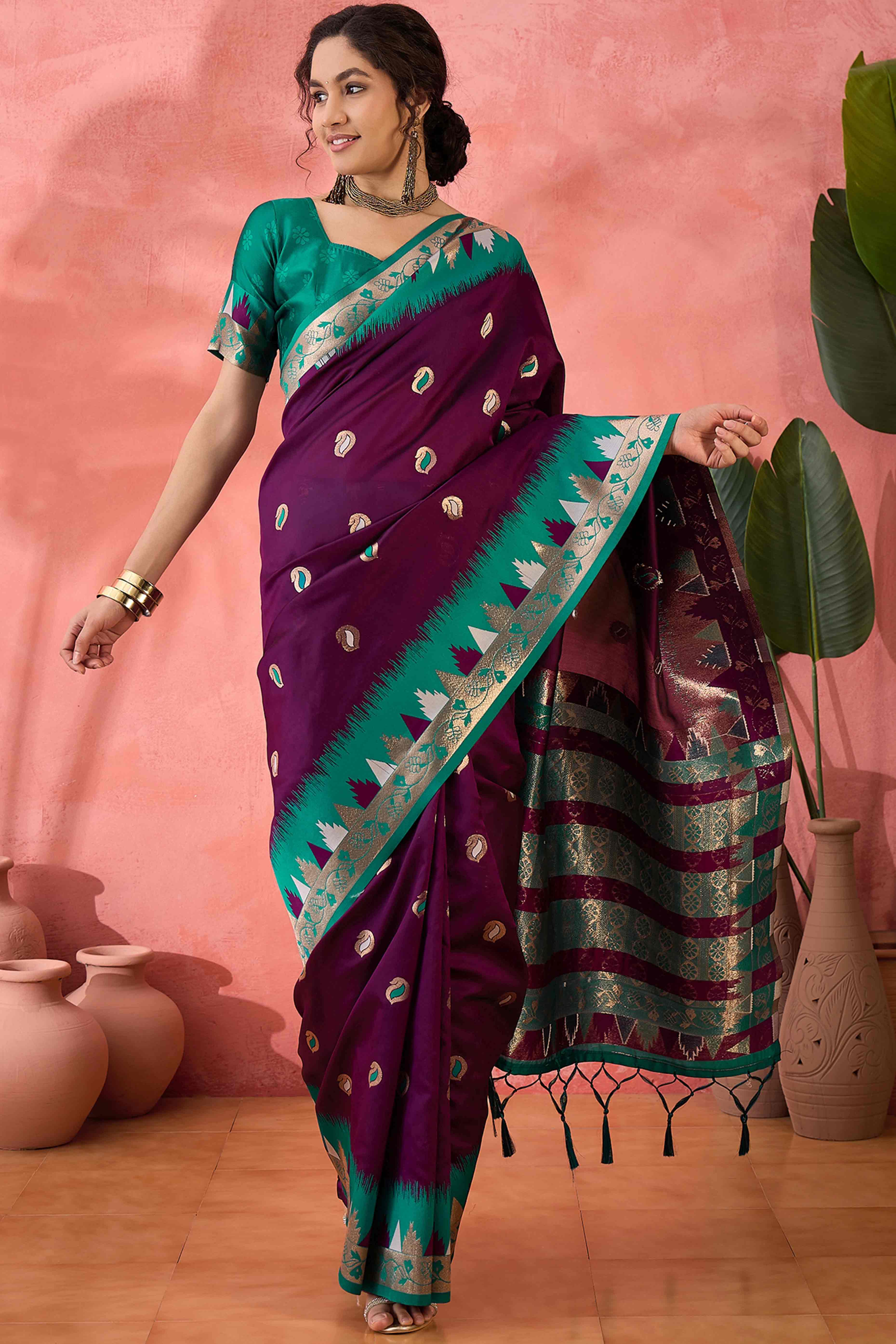 Wine Zari Woven Poly Silk Saree Enhanced With Graceful Tassel Detailing