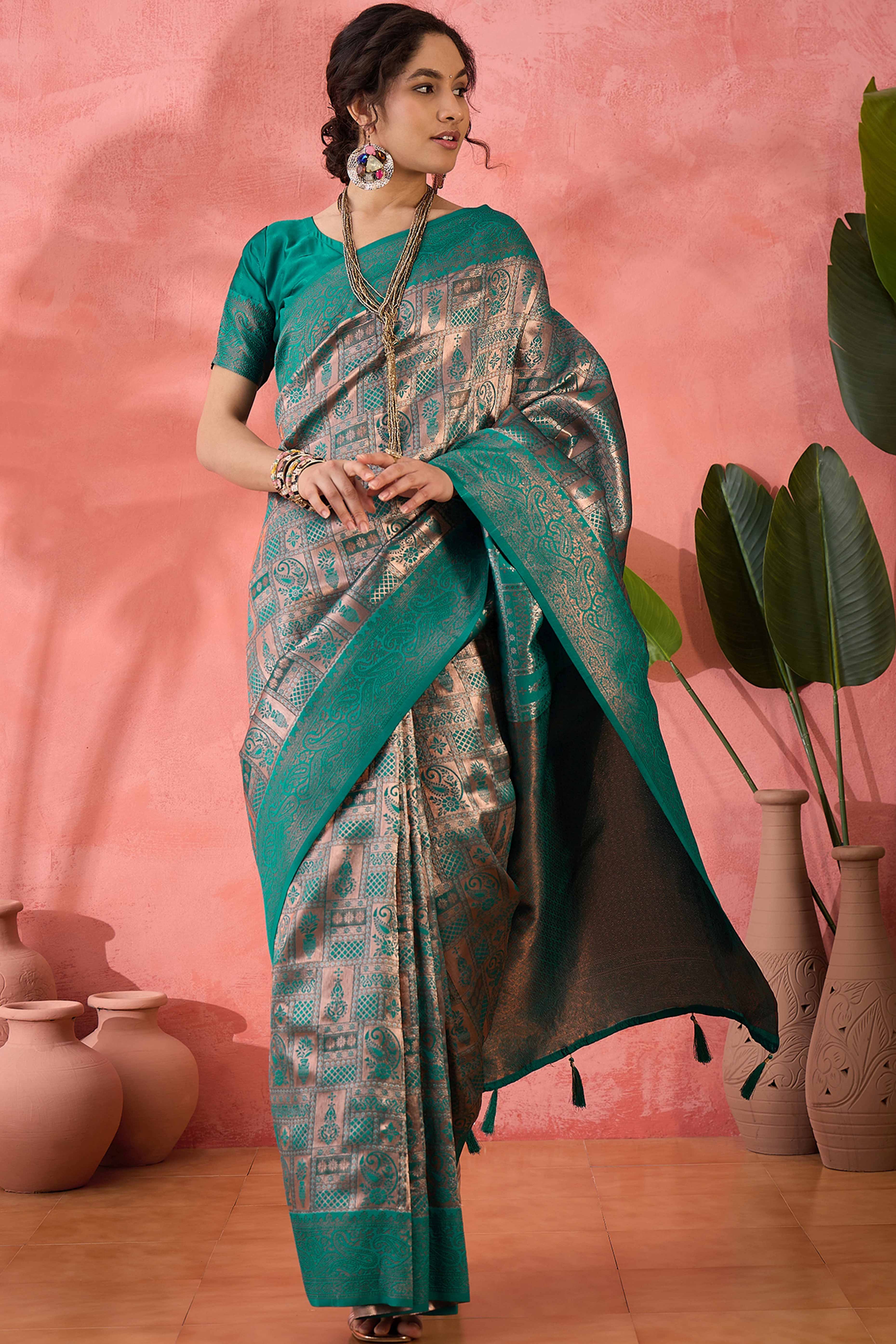 Rama Green Woven Poly Silk Blend Saree Featuring Floral & Paisley Motifs With Tassel Accents