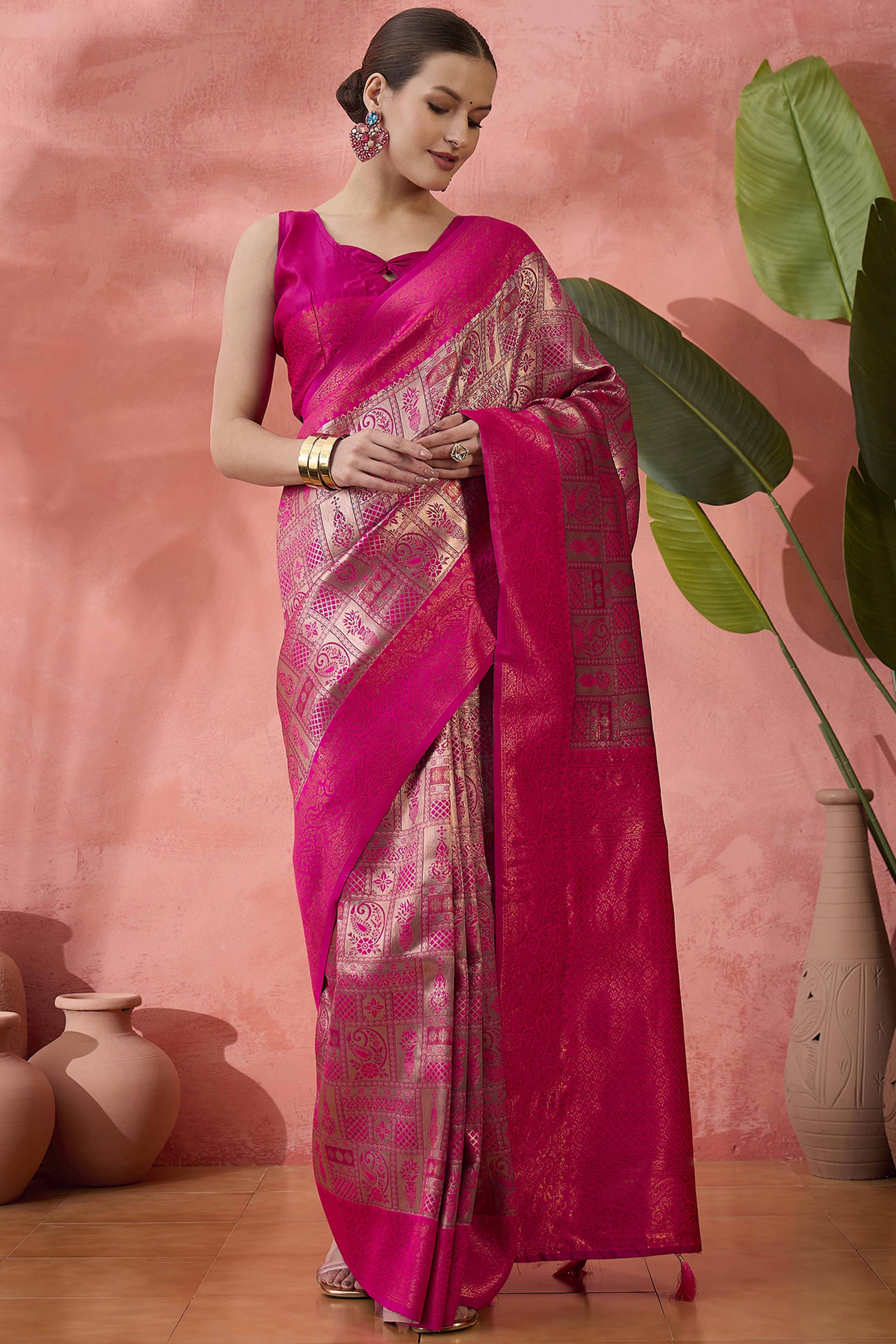 Rani Pink Woven Poly Silk Blend Saree Featuring Floral & Paisley Motifs With Tassel Accents