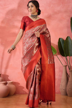 Rust Woven Poly Silk Blend Saree Featuring Floral & Paisley Motifs With Tassel Accents