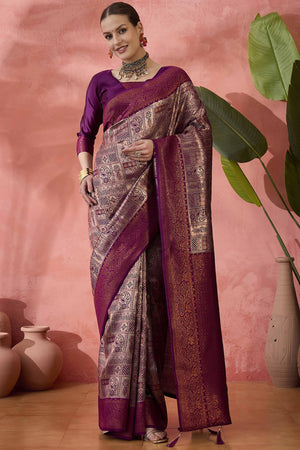 Wine Woven Poly Silk Blend Saree Featuring Floral & Paisley Motifs With Tassel Accents