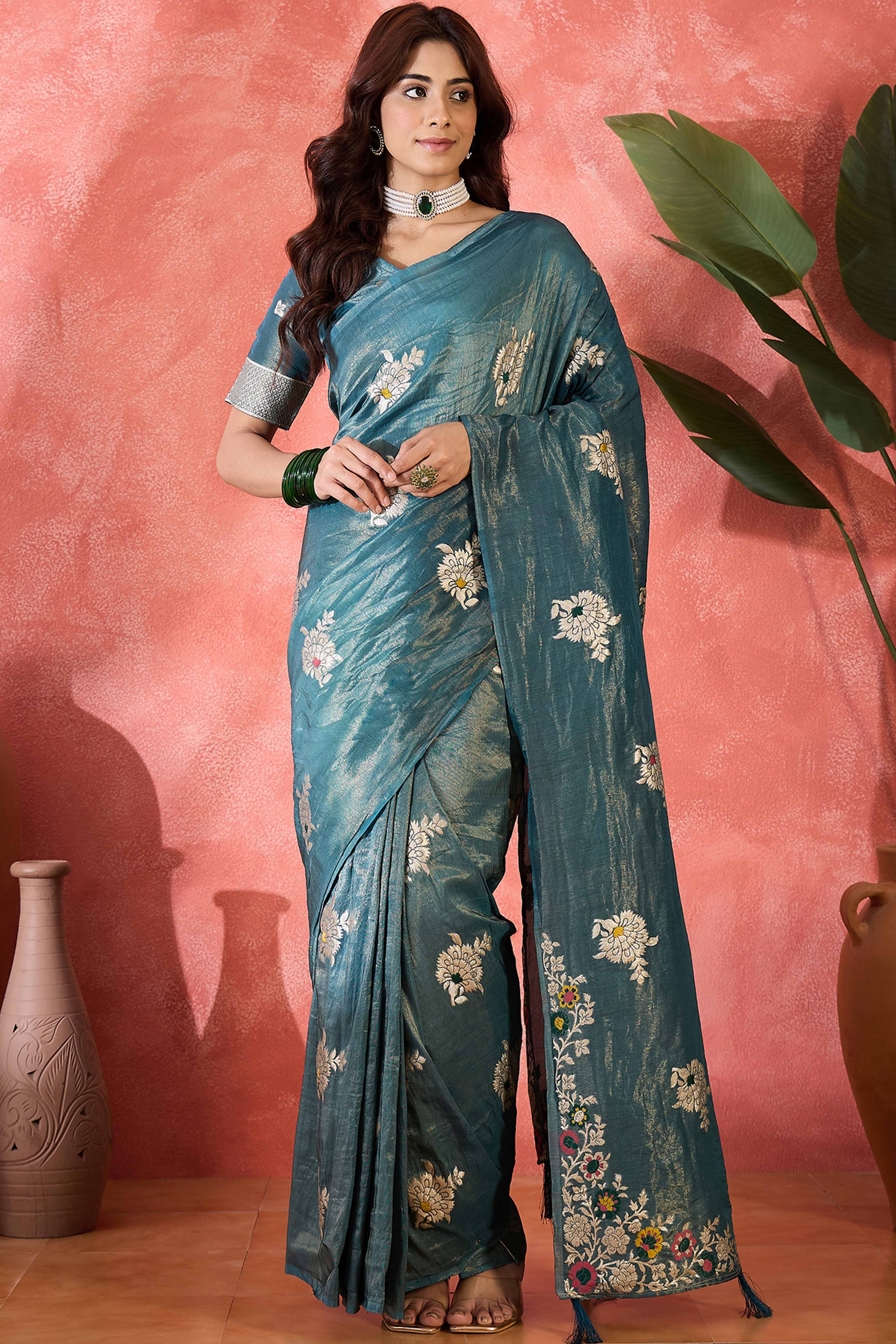 Teal Shimmer Saree Featuring Intricate Floral Zari Weaving & Tassel Finish