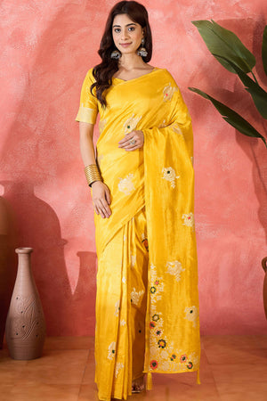 Yellow Shimmer Saree Featuring Intricate Floral Zari Weaving & Tassel Finish