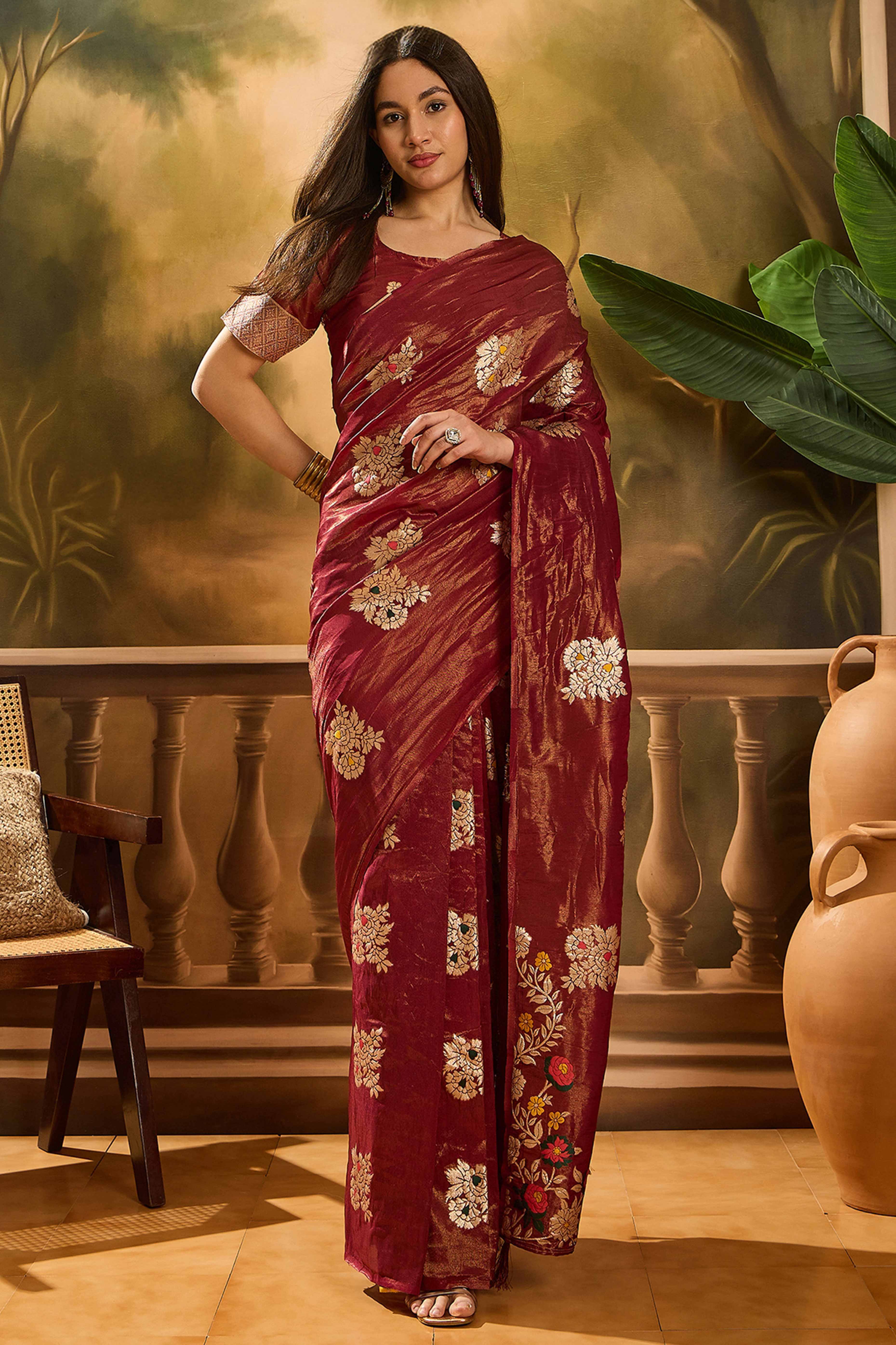 Maroon Saree In Shimmer Fabric With Floral Zari Weaving & Decorative Tassel Pallu