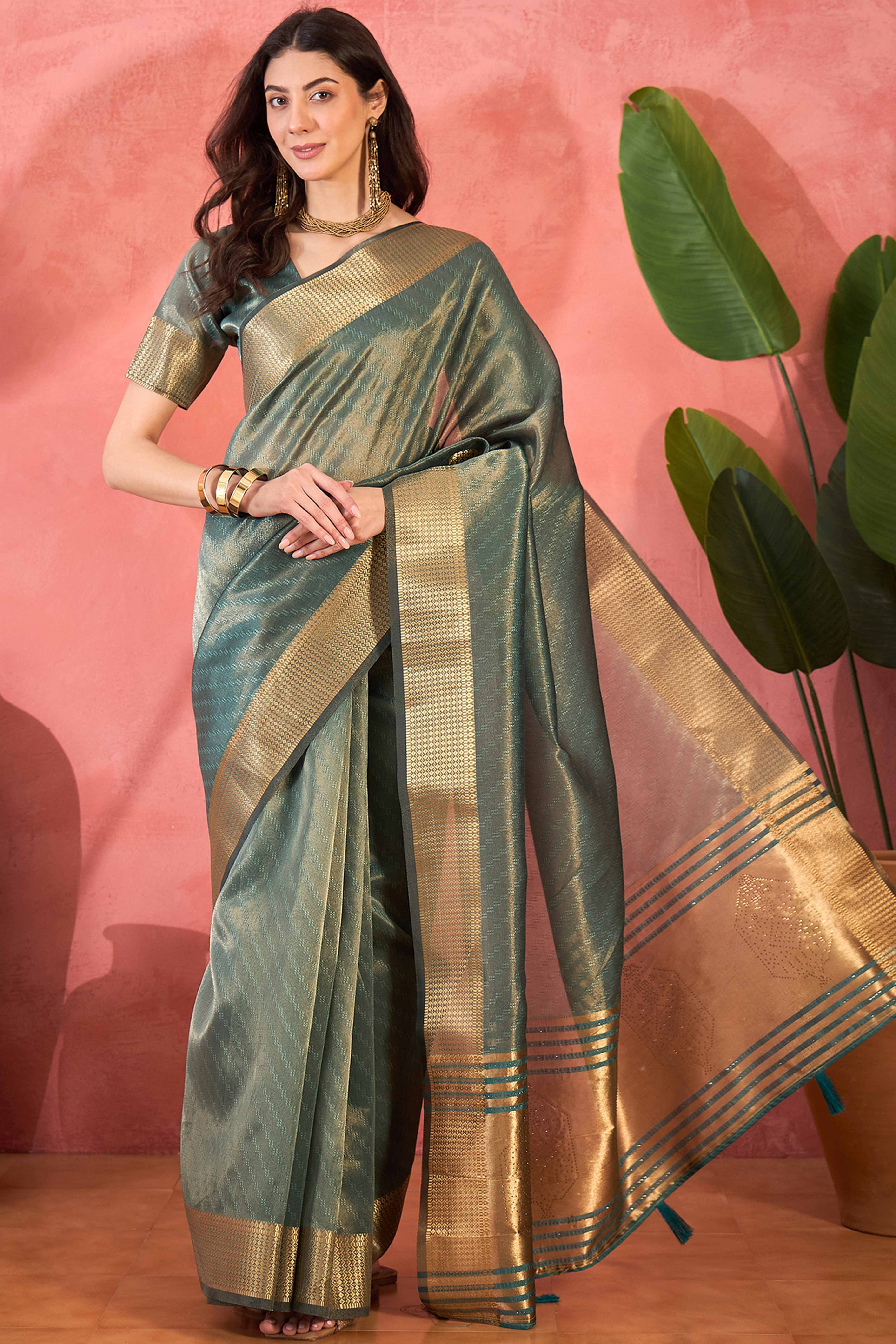 Teal Green Khadi Organza Saree Intricate Weaving & Sparkling Stonework With Tassel Pallu