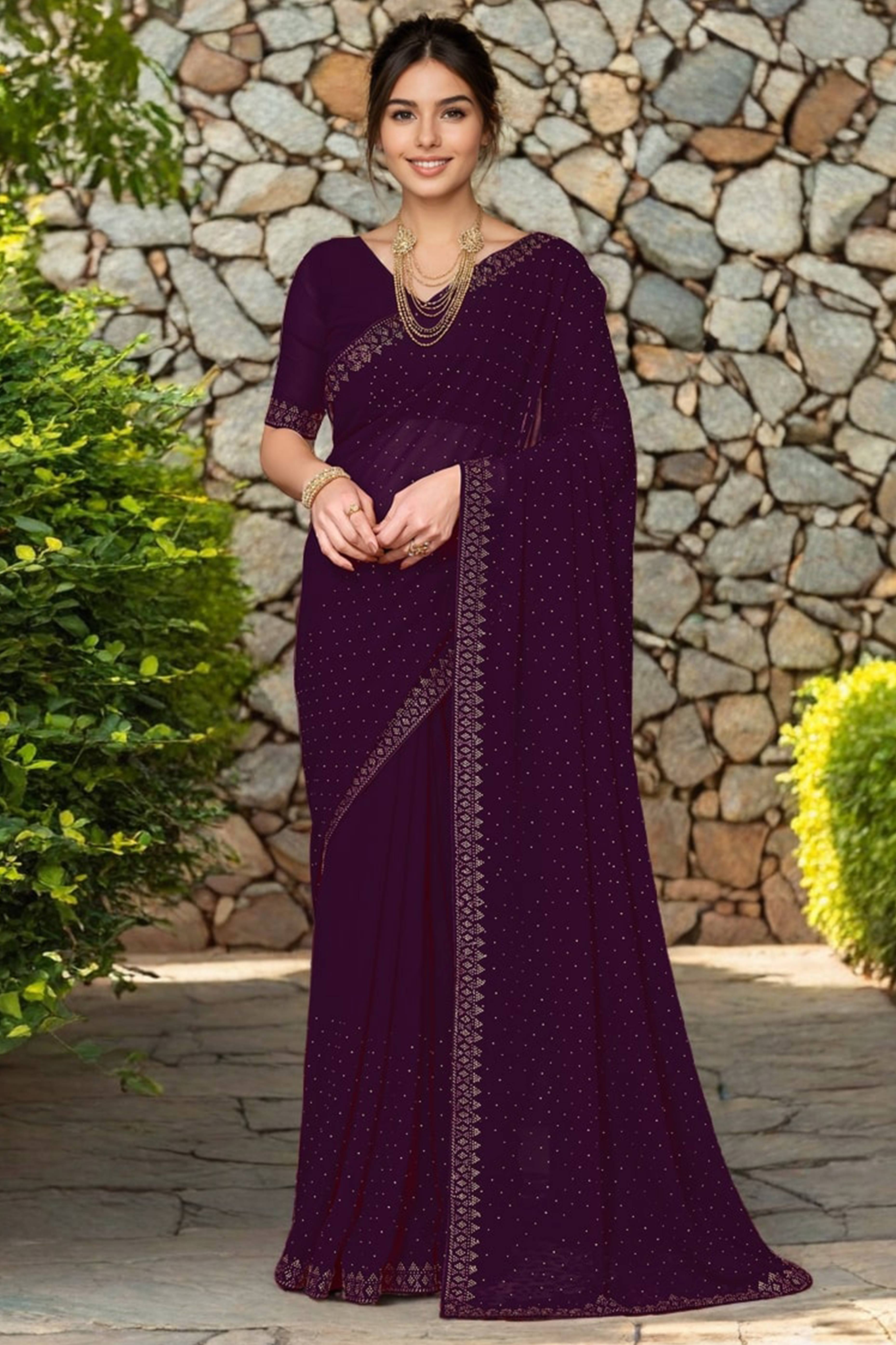 Wine Rangoli Dola Silk Saree Embellished With Diamond Work And Elegant Border