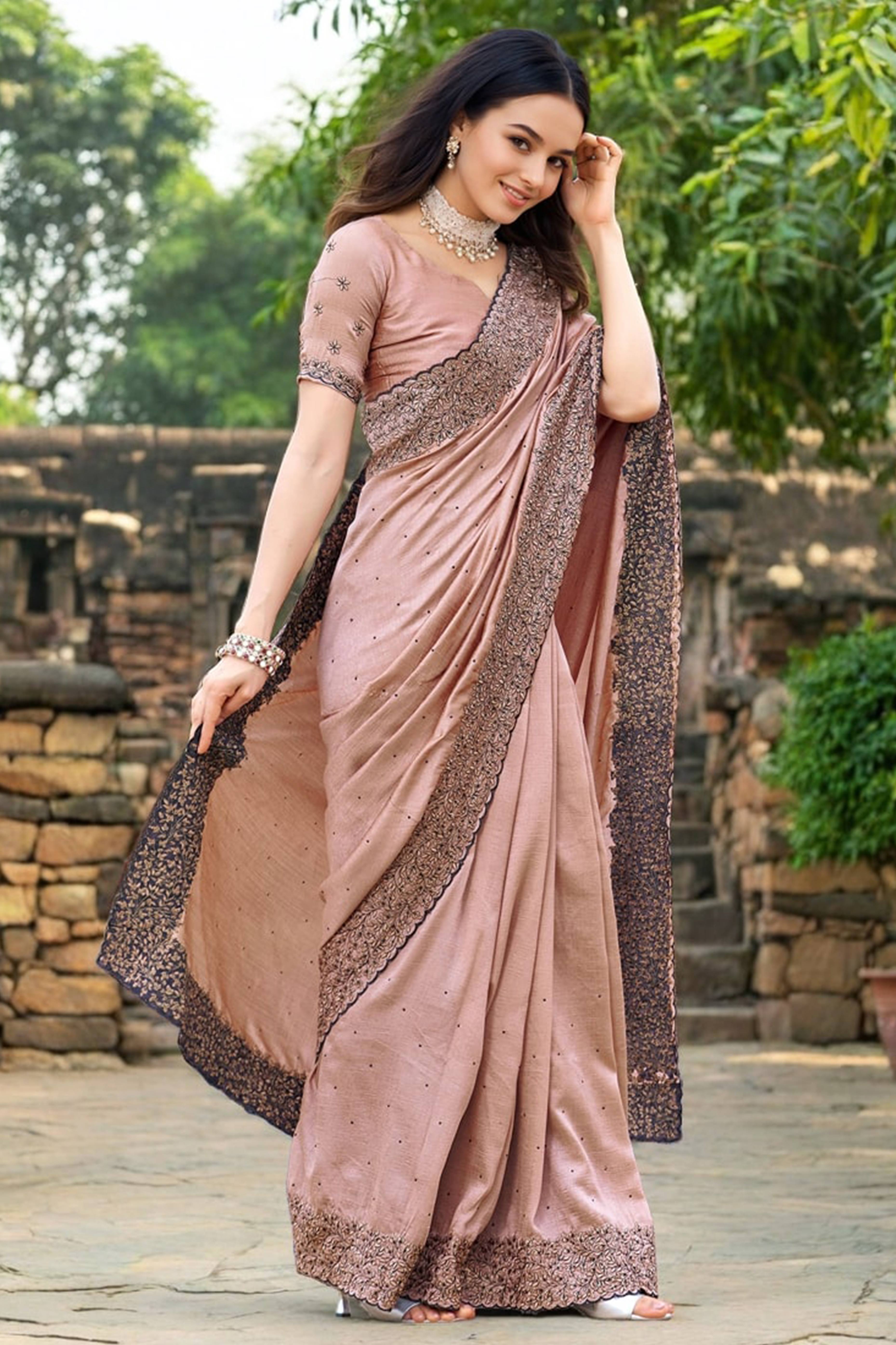 Peach Swarovski Work Rangoli Dola Silk Saree With An Eye Catching Border Design