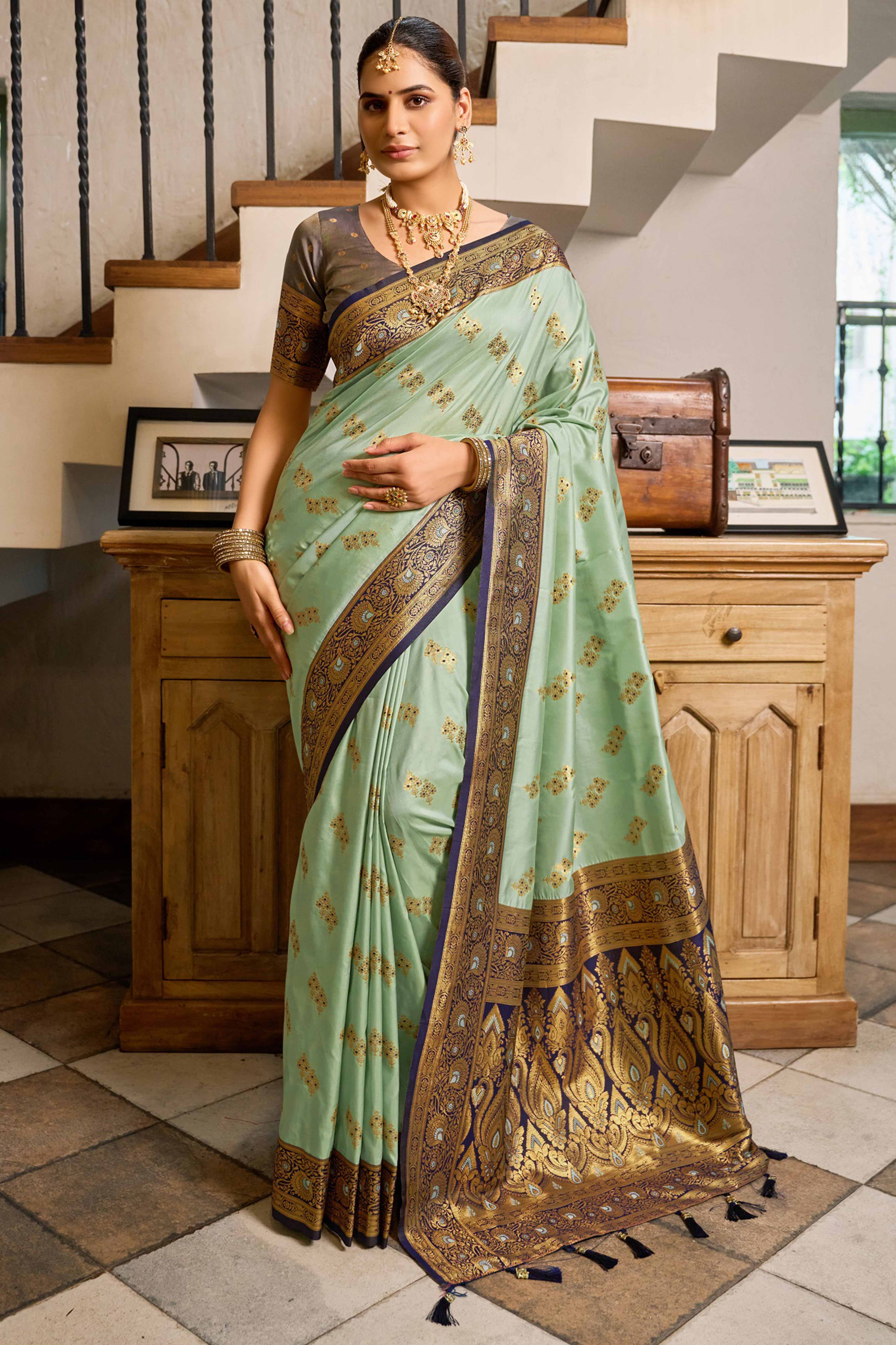 Sea Green Silk Blend Saree Featuring Intricate Floral Zari Work
