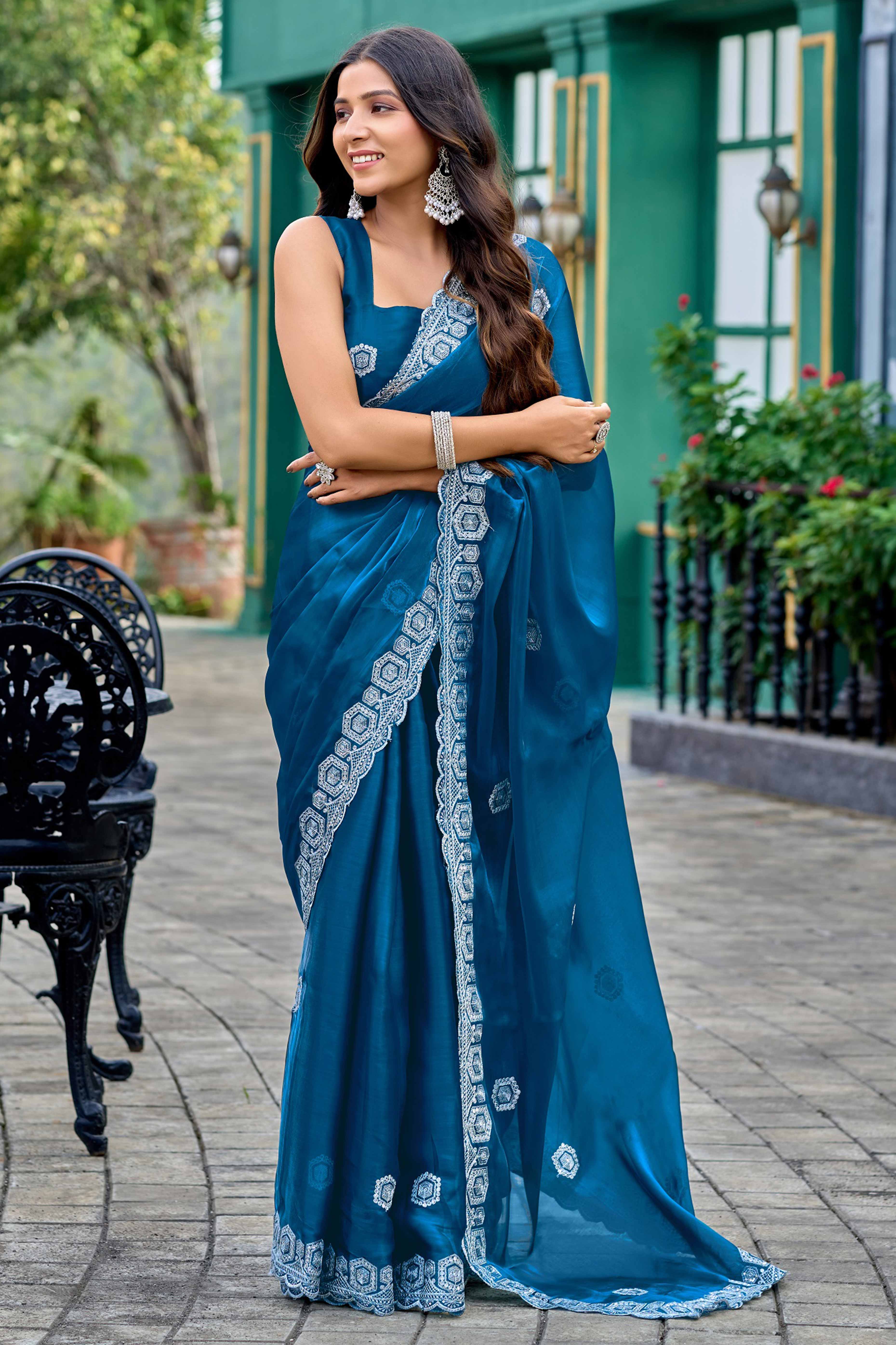 Shimmering Teal Chiffon Saree with Delicate Sequins Work