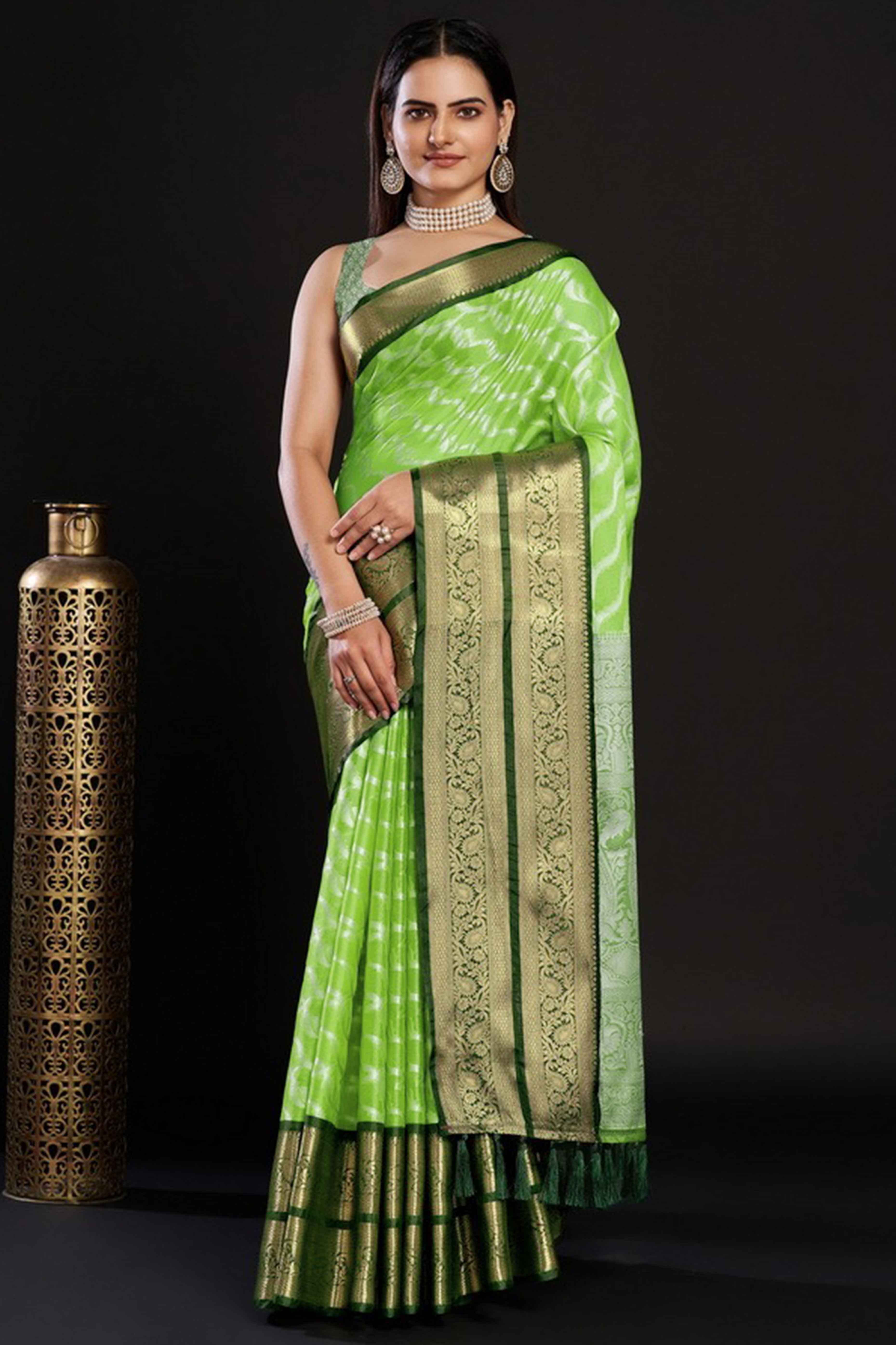 Parrrot Green Kanjivaram Silk Saree Adorned With Zari Weaving & Graceful Tassels