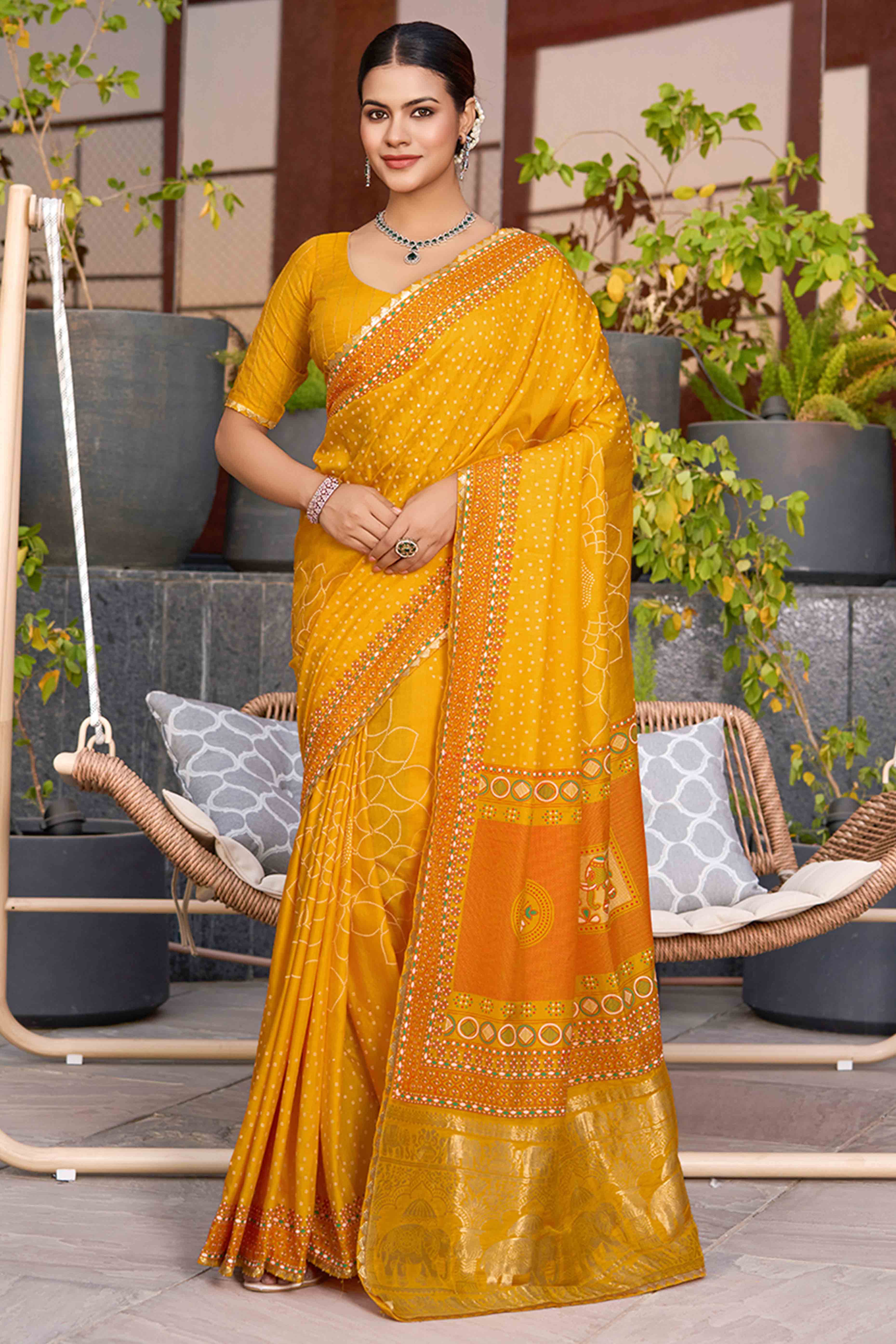 Feel The Luxury Of Mustard Bandhani Foil Printed Cotton Silk Sarree With Lace Border