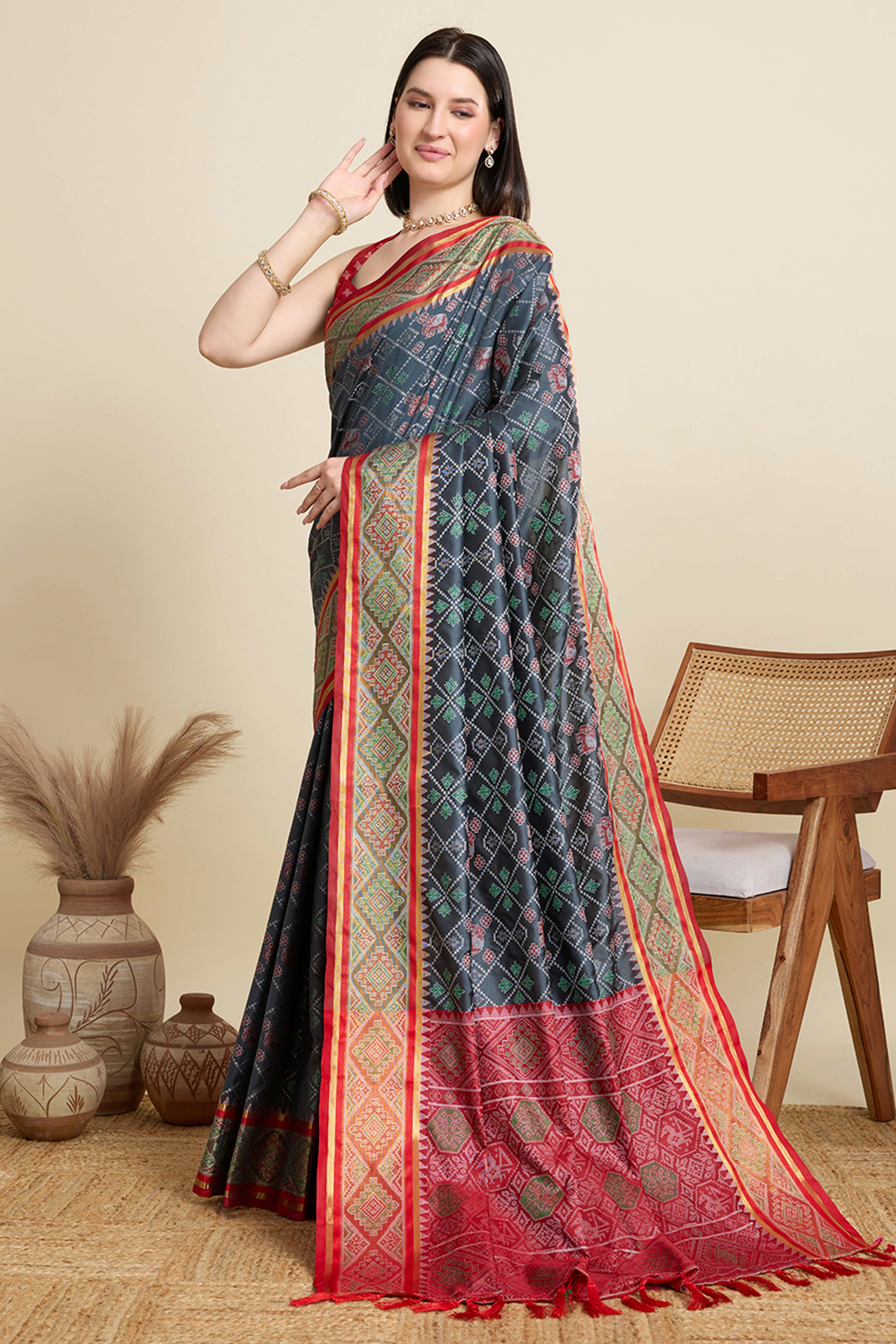 Grey Silk Blend Saree Featuring Patola Prints and a Detailed Weaving Border