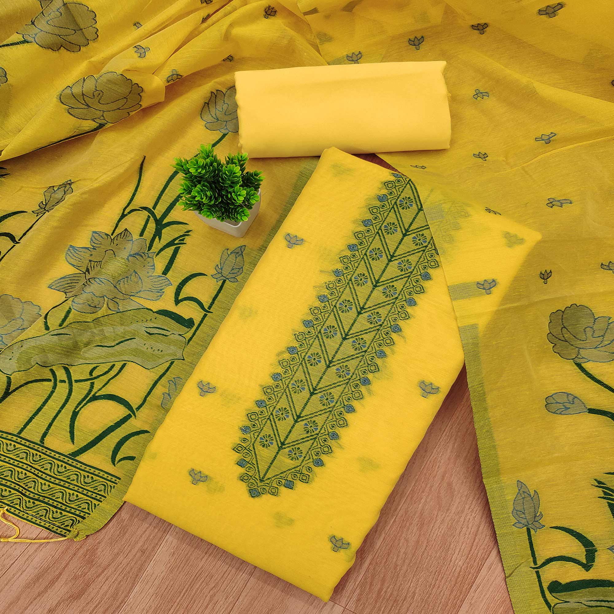 Yellow Ethnic Dress Material Showcasing Handloom Style Floral Zari Weaving