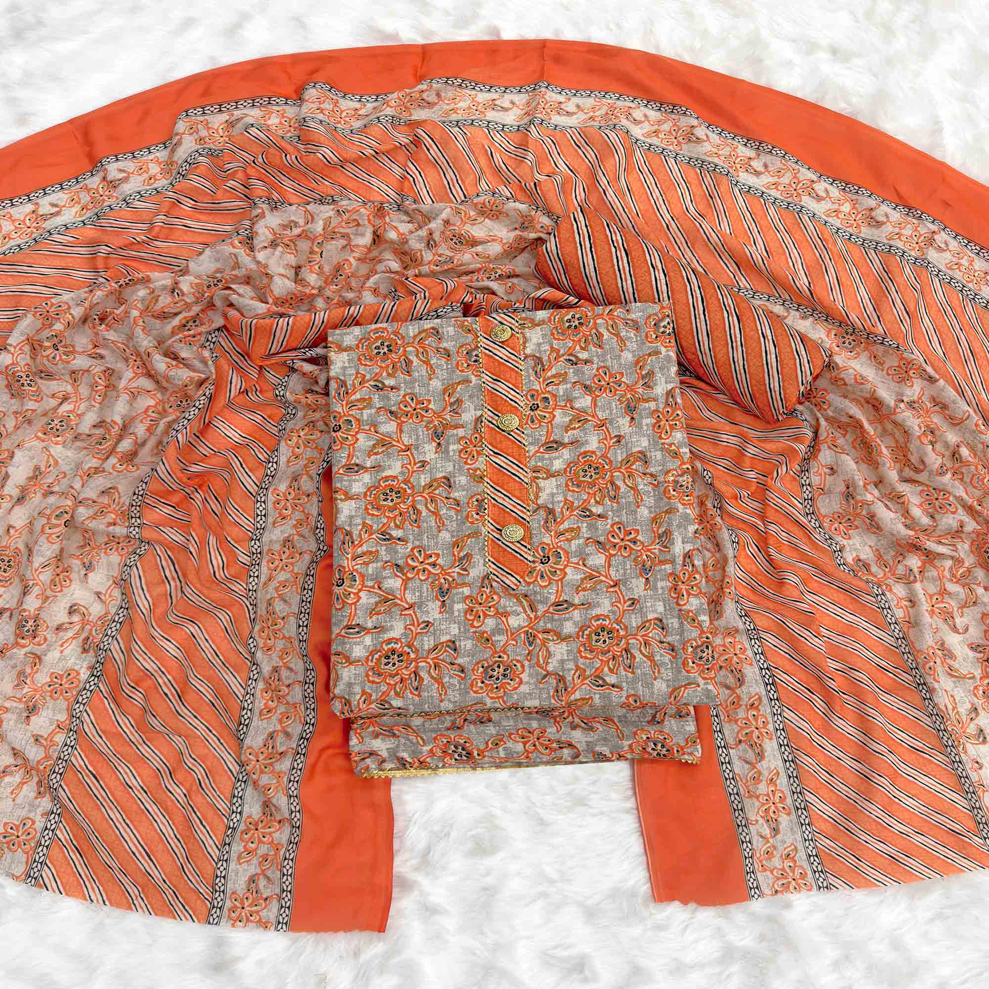 Charming Orange Floral Printed Cotton Blend Dress Material Featuring Intricate Lace Border