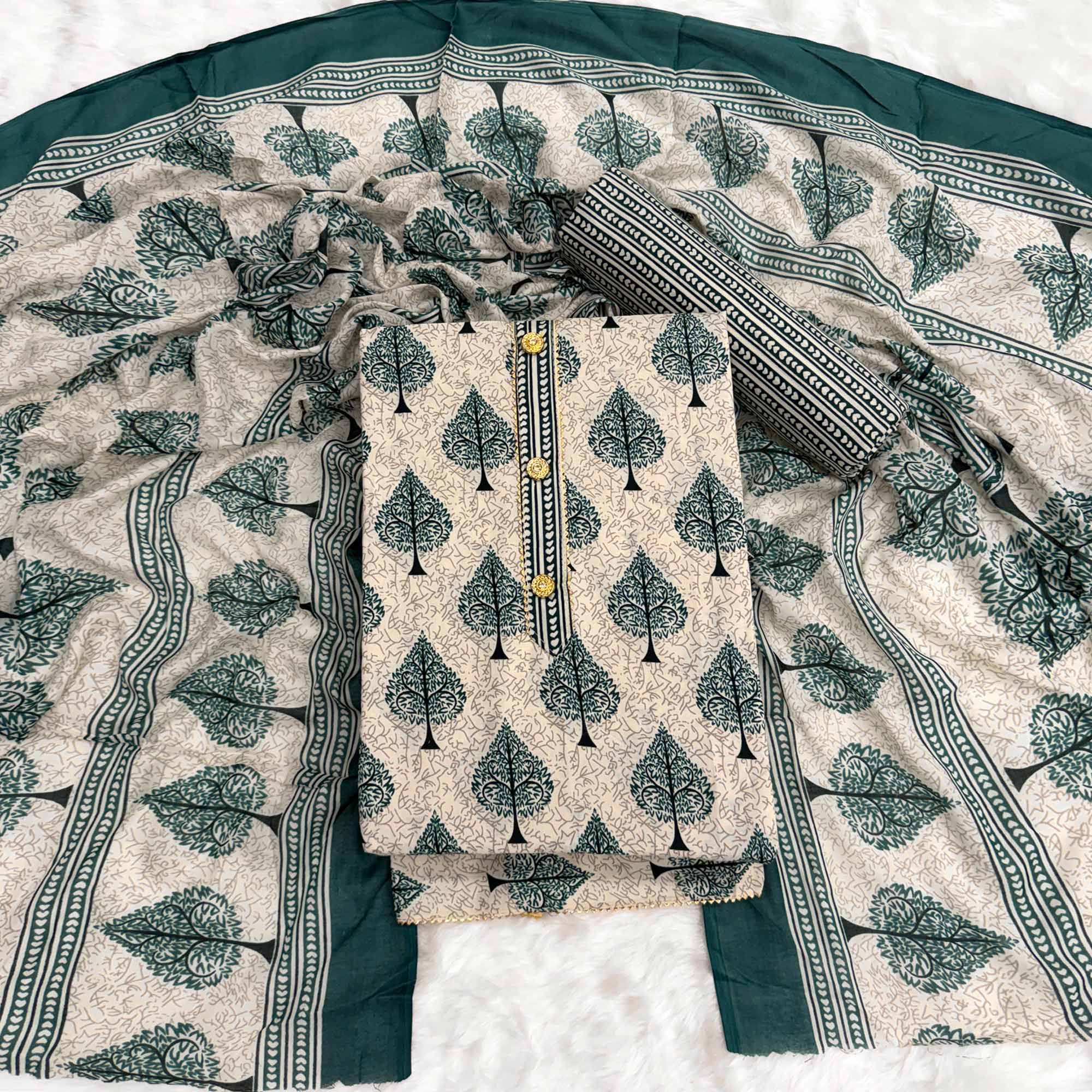 Vibrant Teal Green Leaf Printed Cotton Blend Dress Material Refined With Lace Border