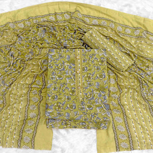 Elegant Olive Green Floral Printed Cotton Blend Dress Material Adorned With Intricate Lace Border