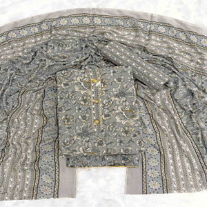 Elegant Grey Floral Printed Cotton Blend Dress Material Adorned With Intricate Lace Border