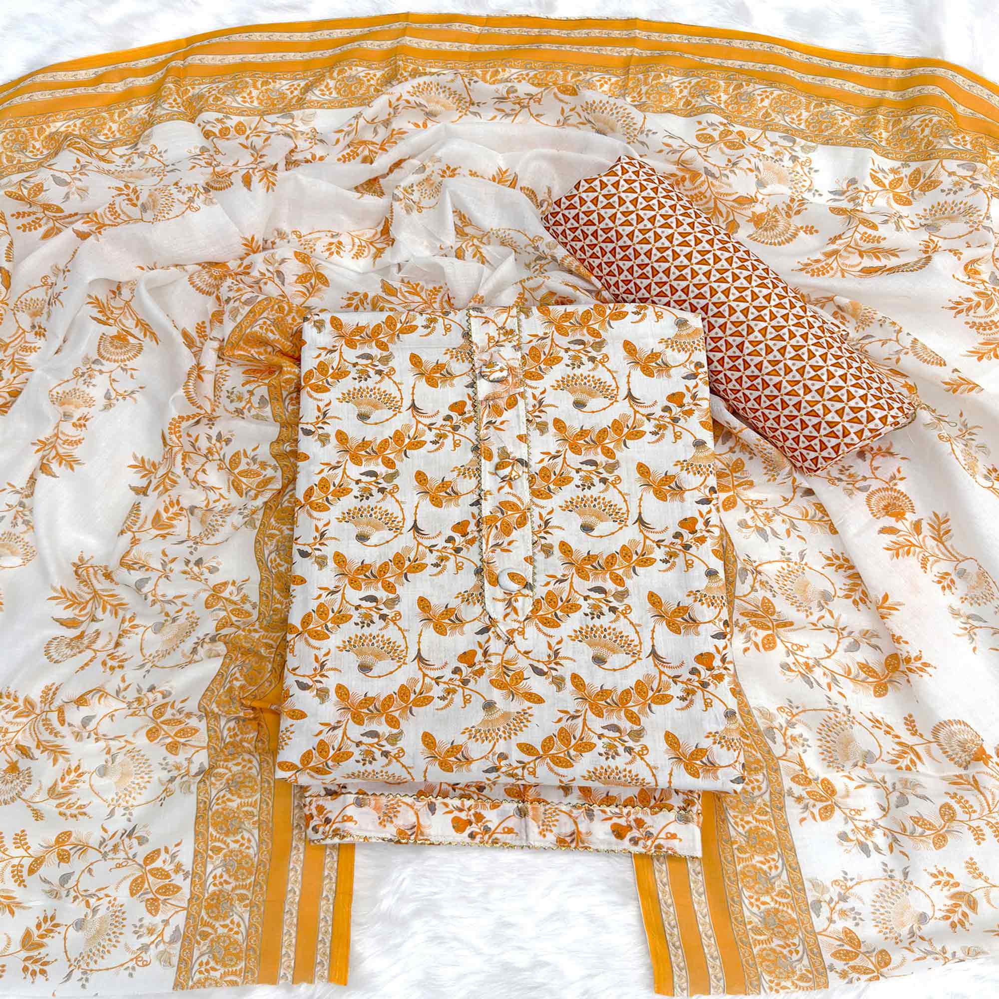 Elegant Mustard Floral Printed Pure Cotton Dress Material With Tie Neck & Fancy Button