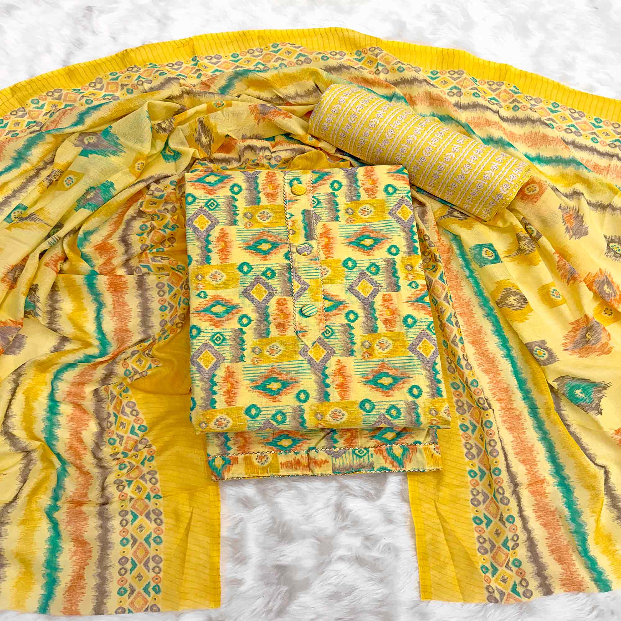 Yellow Contemporary Ikat & Geometric Style Print Pure Cotton Dress Material With Decorative Button