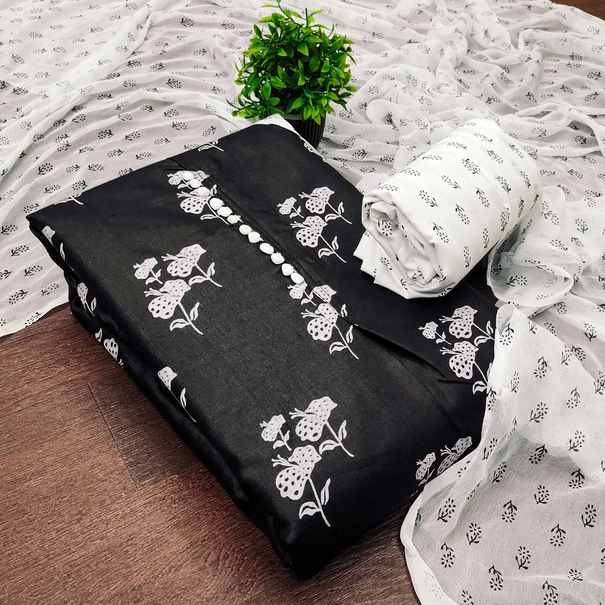 Black Cotton Blend Fabric Featuring Subtle and Elegant Floral Prints