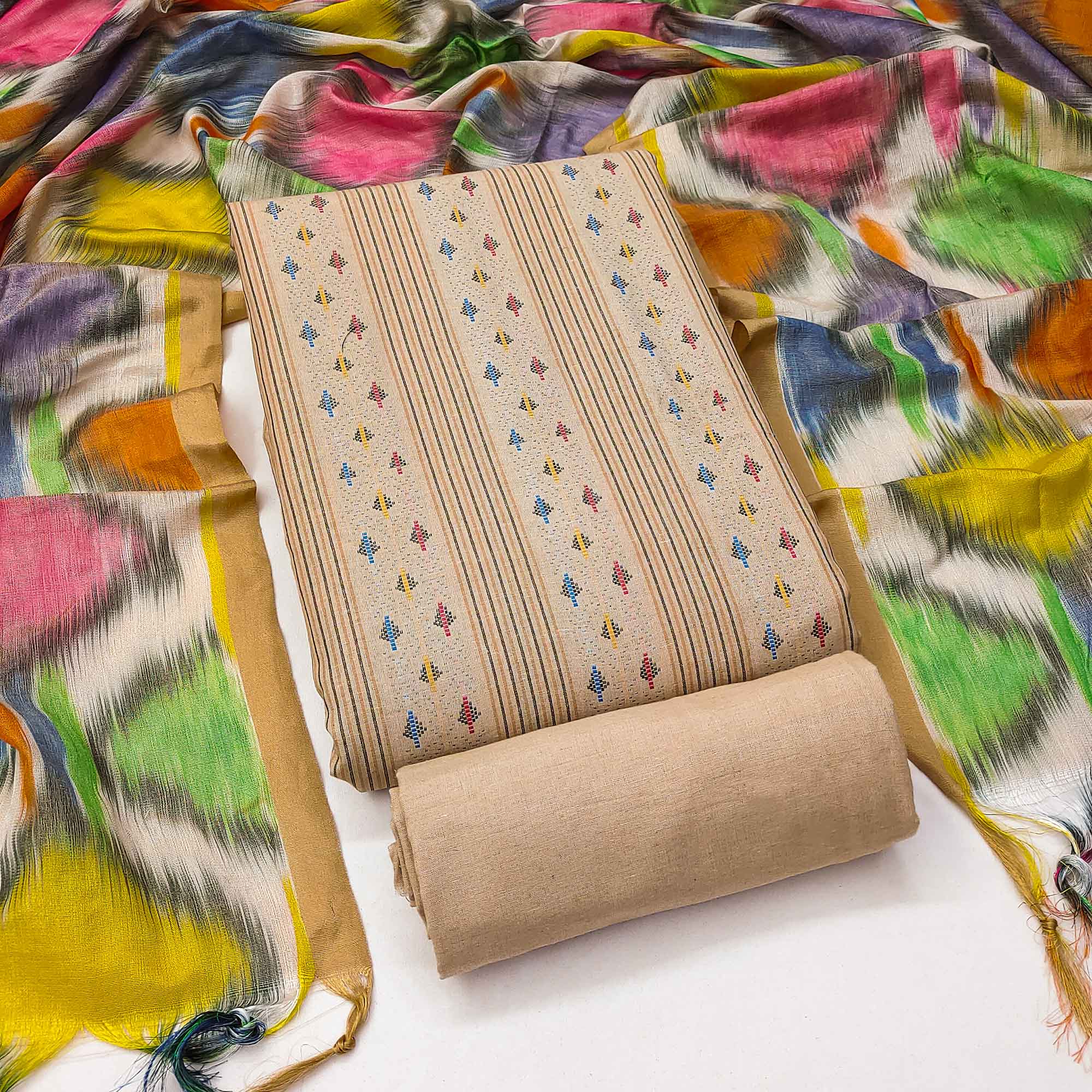 Make a Statement With Chikoo Woven Cotton Blend Dress Material