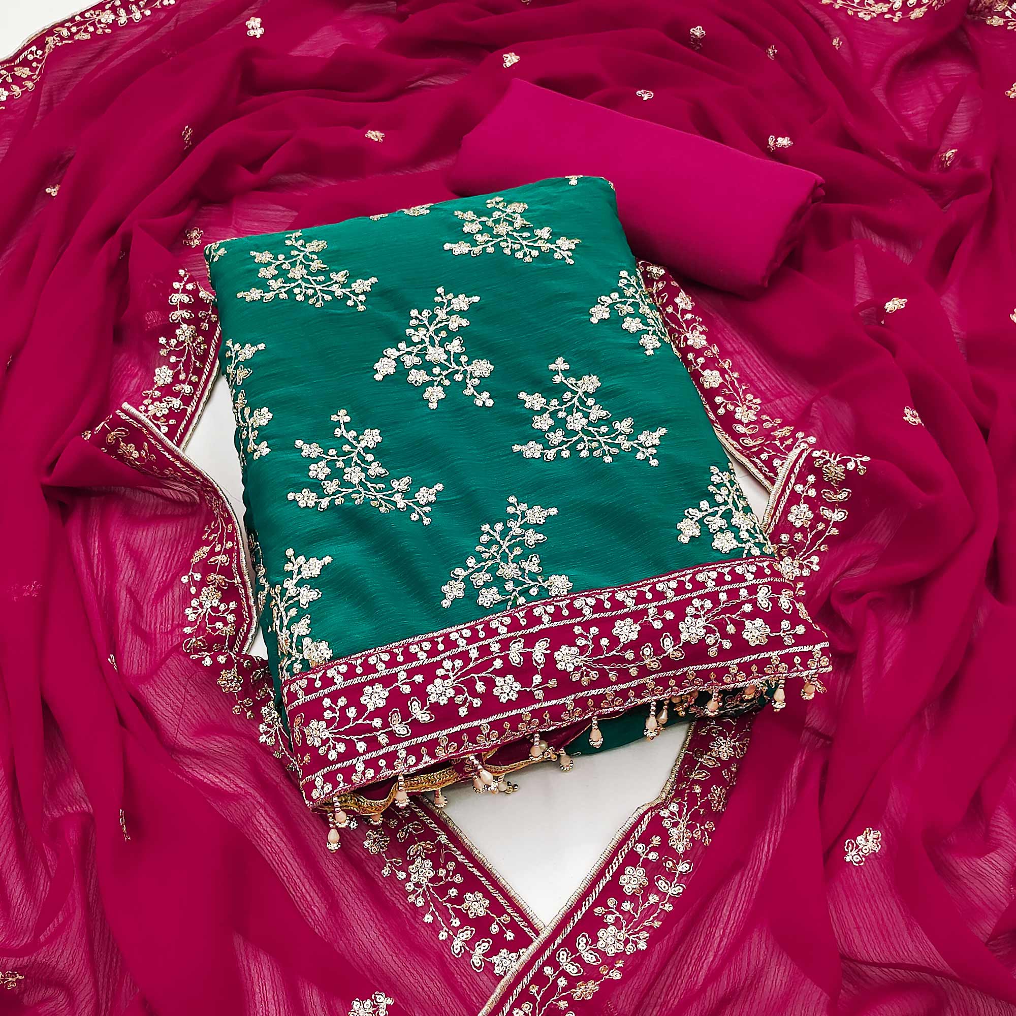 Unleash Your Style With This Rama Green Floral Sequins Embroidered Zomoto Art Silk Dress Material