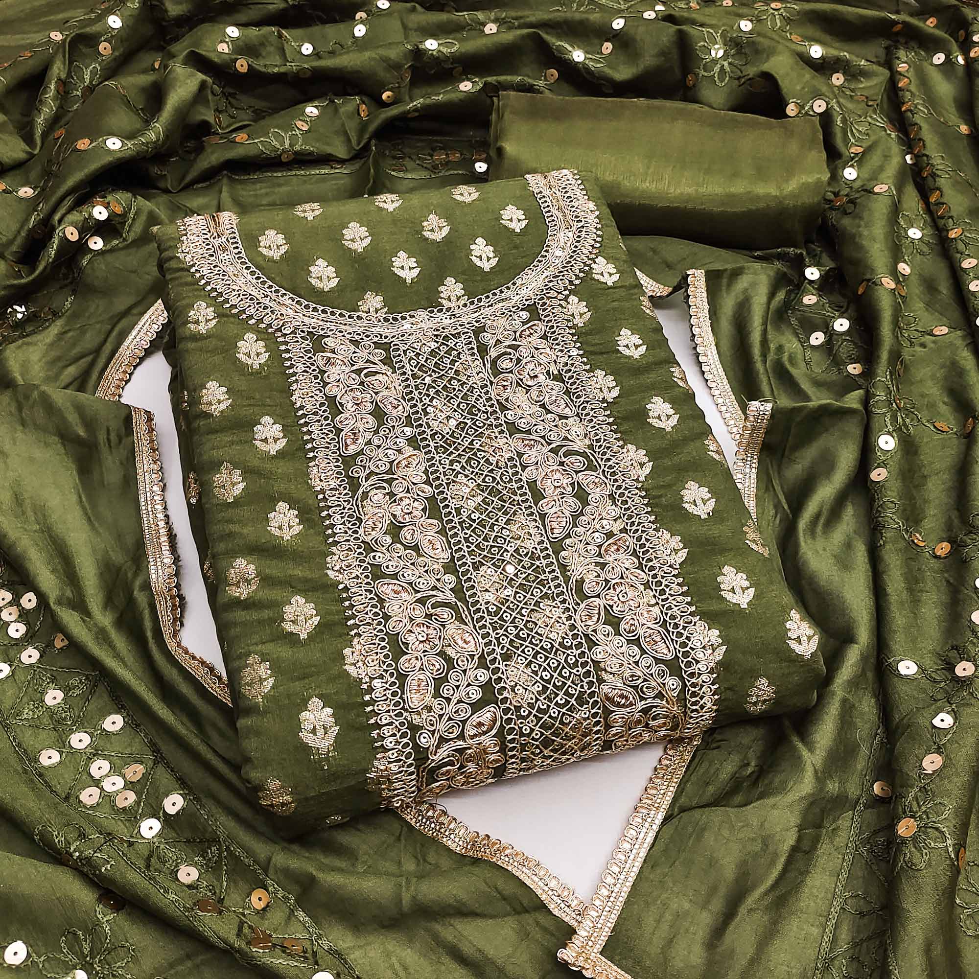 Green Chanderi Cotton Fabric with Elegant Butti Zari Weaving for a Festive Yet Soft Look
