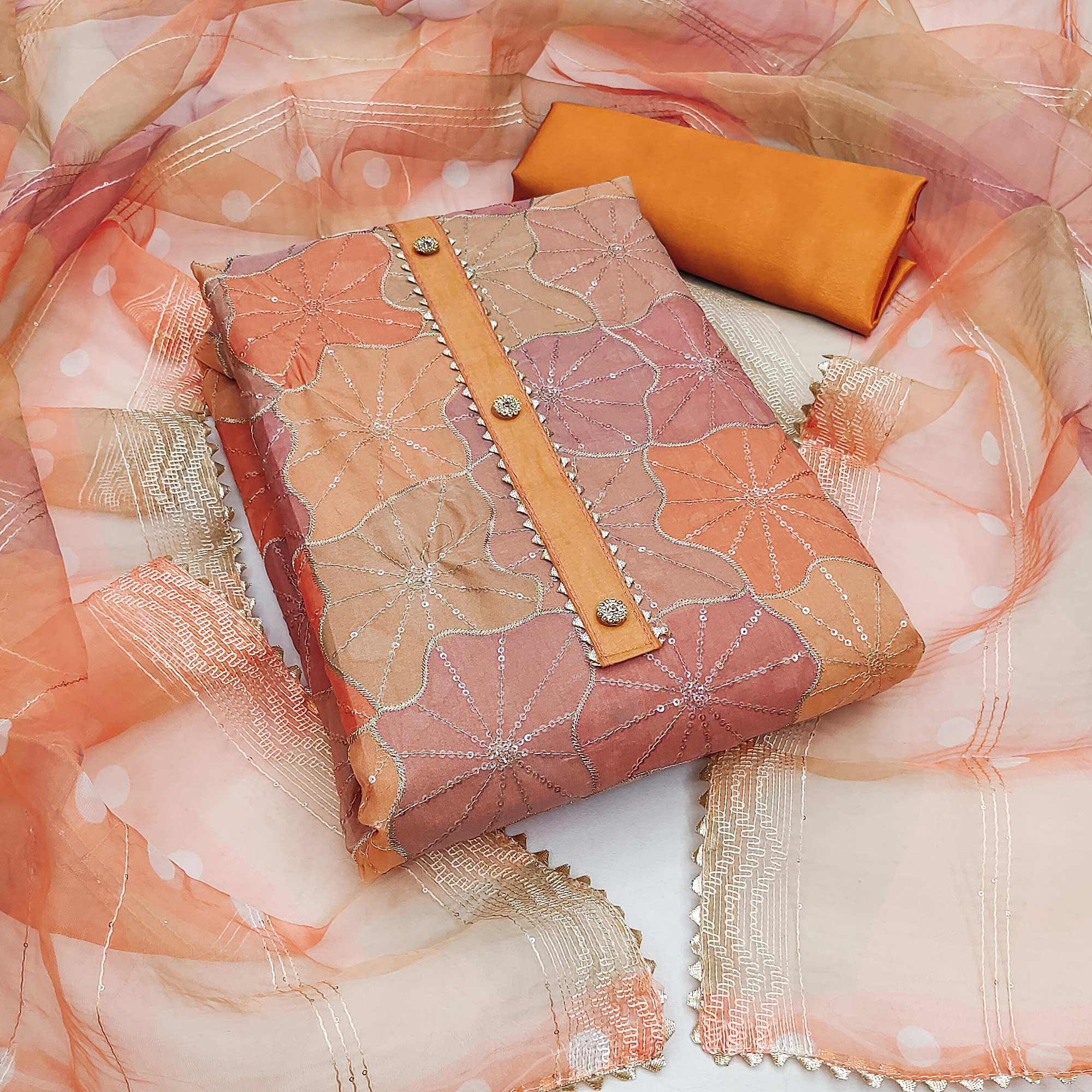 Orange Organza Suit Material with Delicate Sequins Embroidery to Elevate Your Look