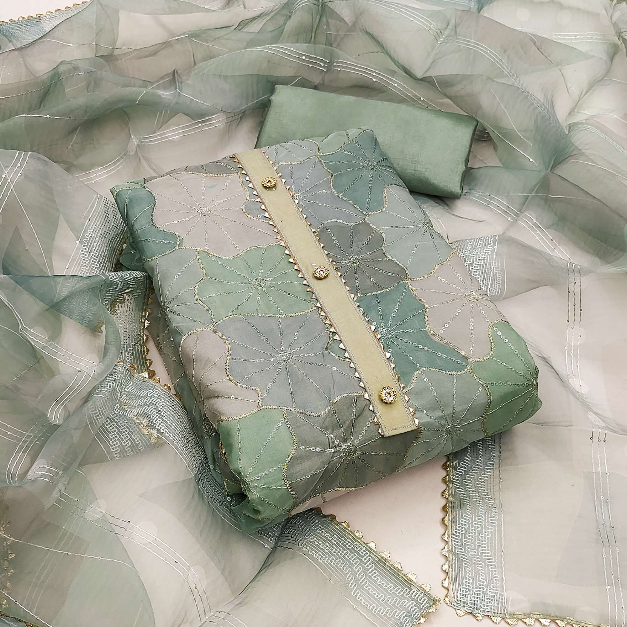 Sea Green Organza Suit Material with Delicate Sequins Embroidery to Elevate Your Look