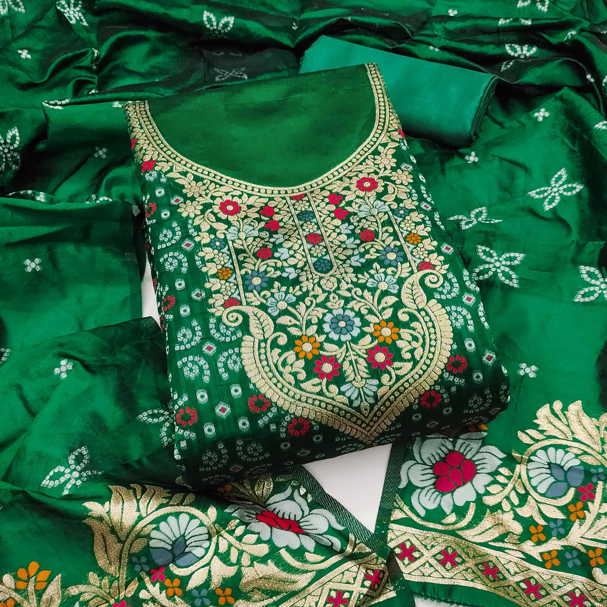 Green Banarasi Silk Jacquard Dress Material Adorned With Intricate Floral Zari Weaving