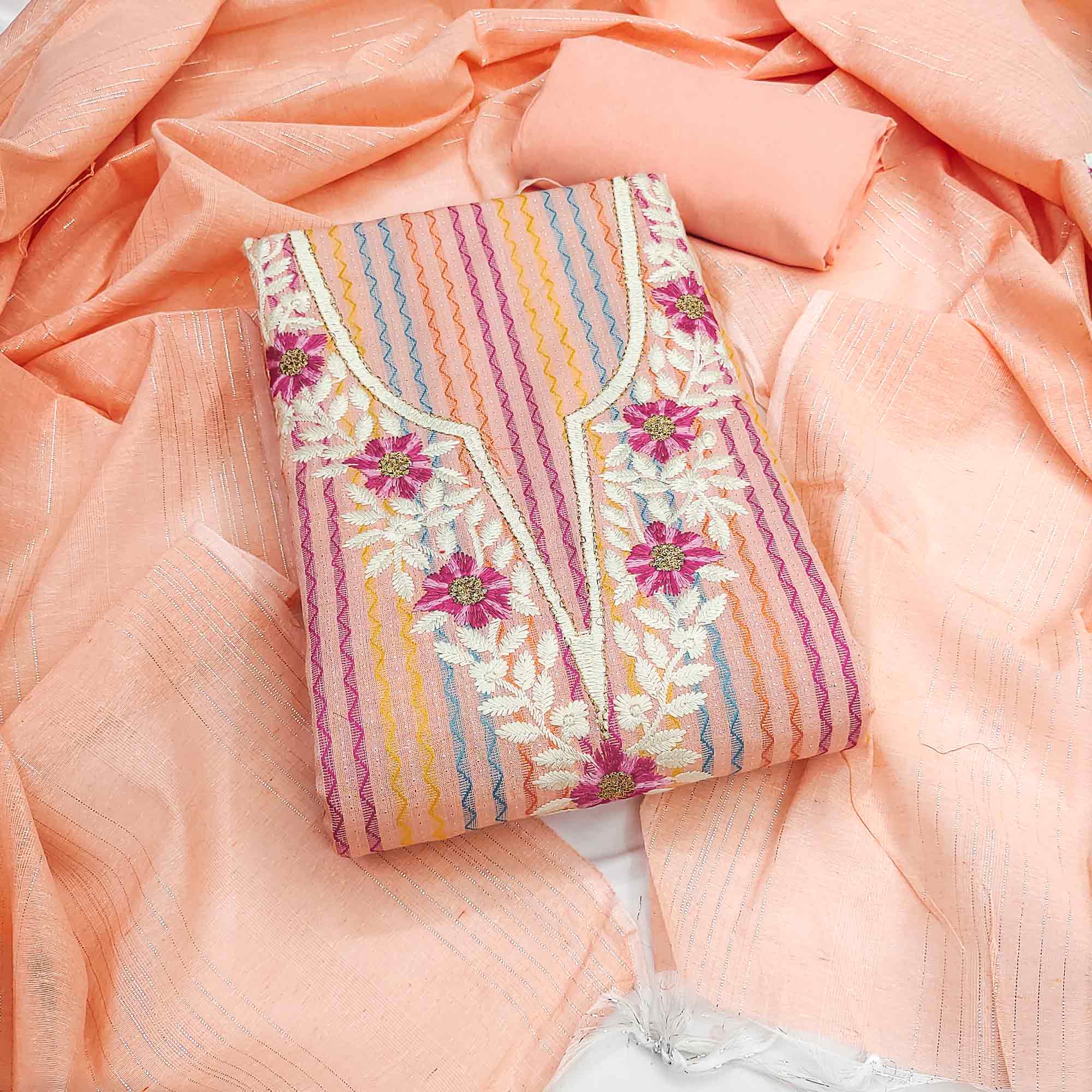 Peach Cotton Blend Dress Material Highlighted With Floral Embroidery & Modern Stripes
