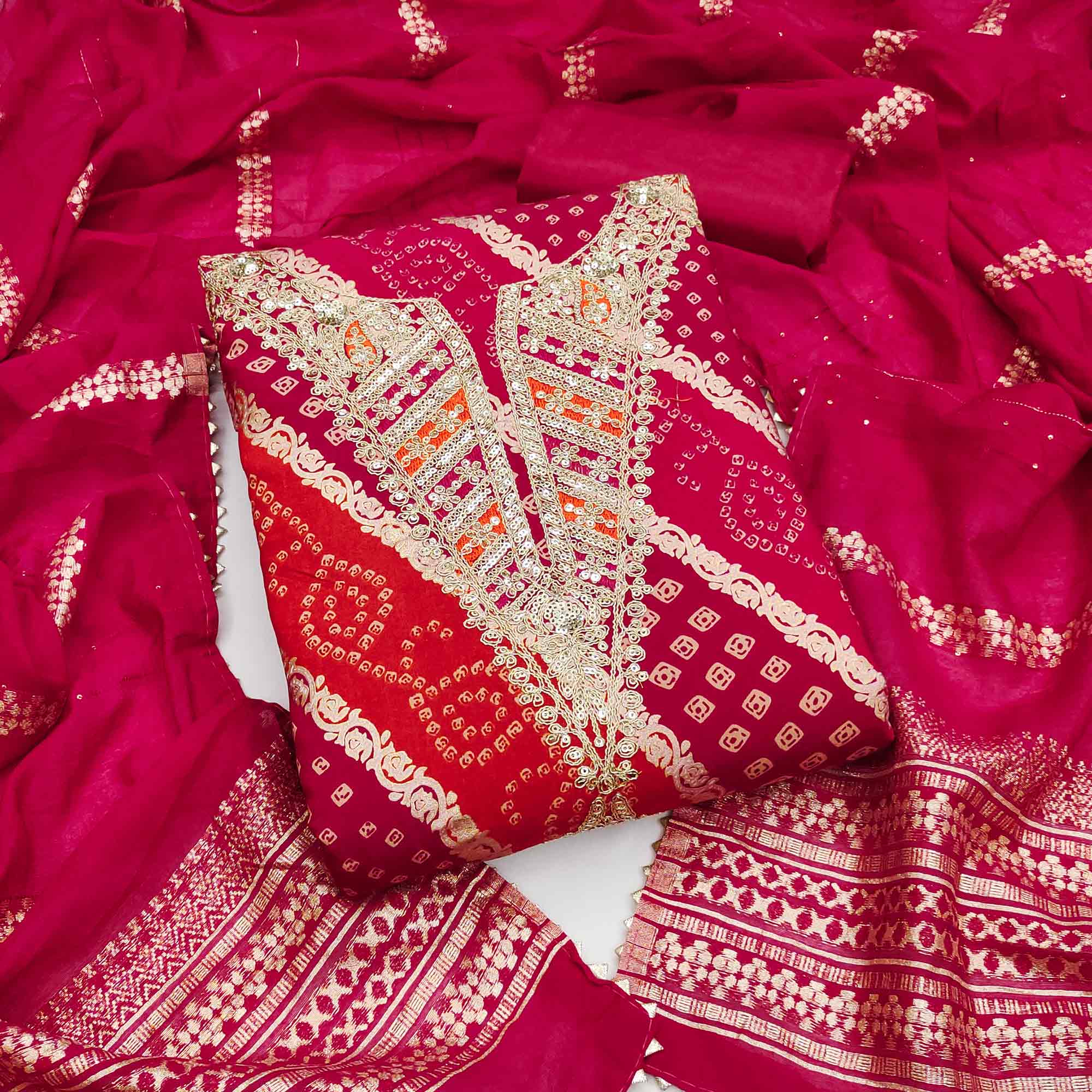 Charming Rani Pink Roman Art Silk Dress Material With Bandhani Prints & Floral Cording Embroidery