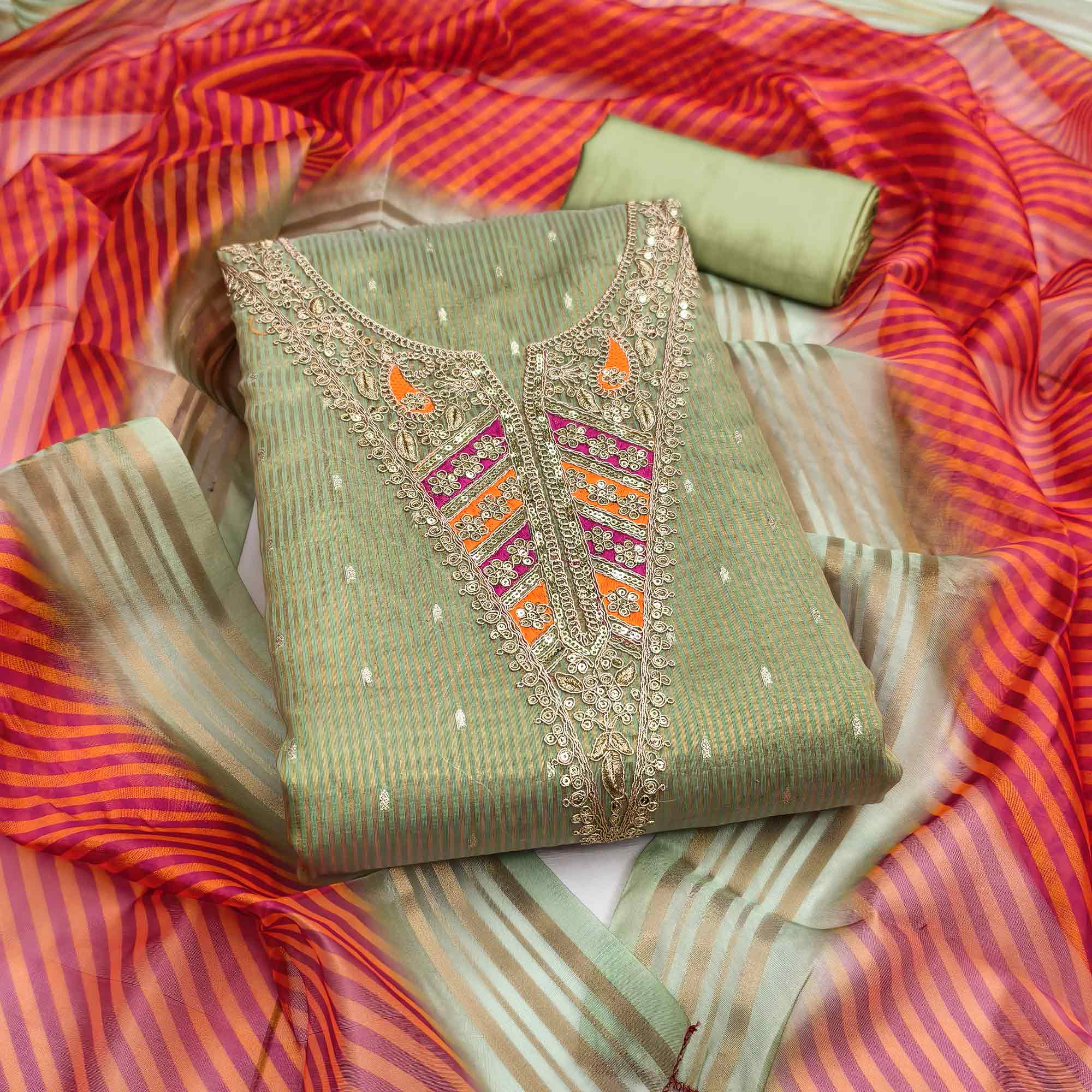 Premium Green Shimmer Dress Material With Detailed Butti Weaving & Cording Embroidery
