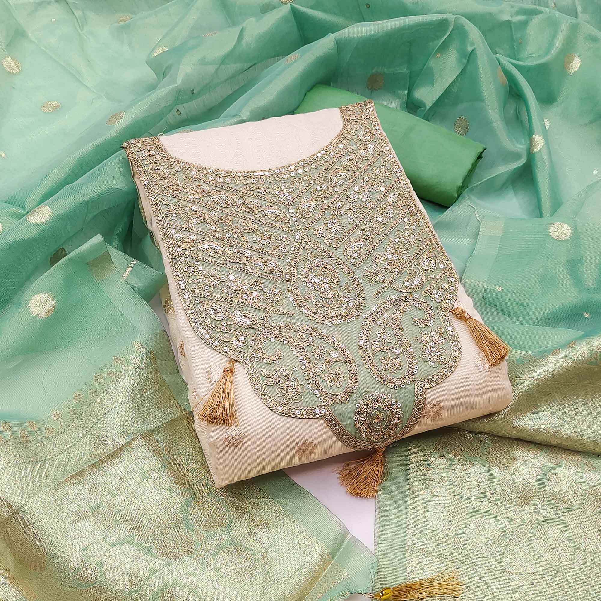 Cream & Turquoise Butti Weaving Shimmer Silk Dress Material Accented With Sequin Cording Embroidery