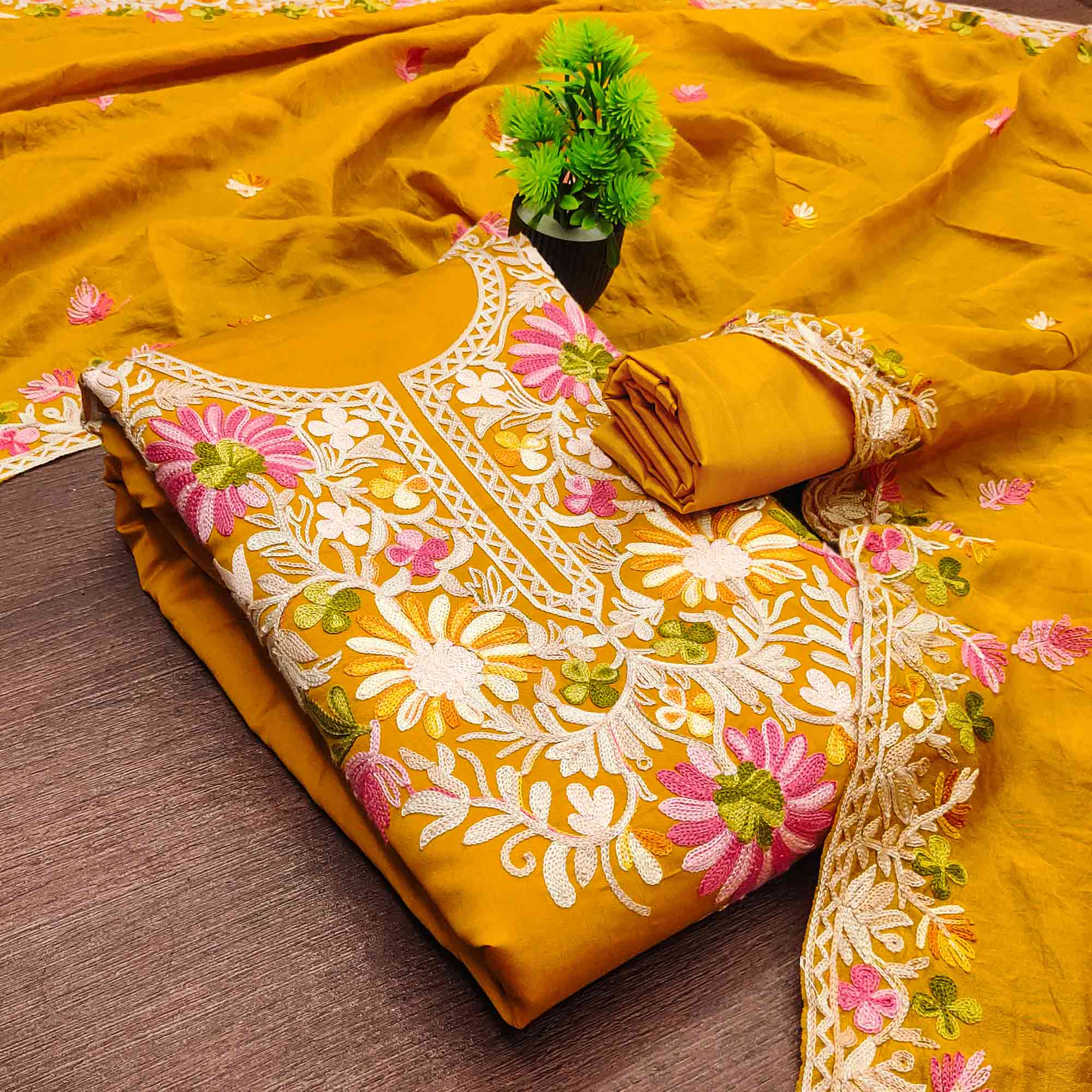 Dark Mustard Designer Roman Art Silk Dress Material Adorned With Floral Thread Embroidery Work