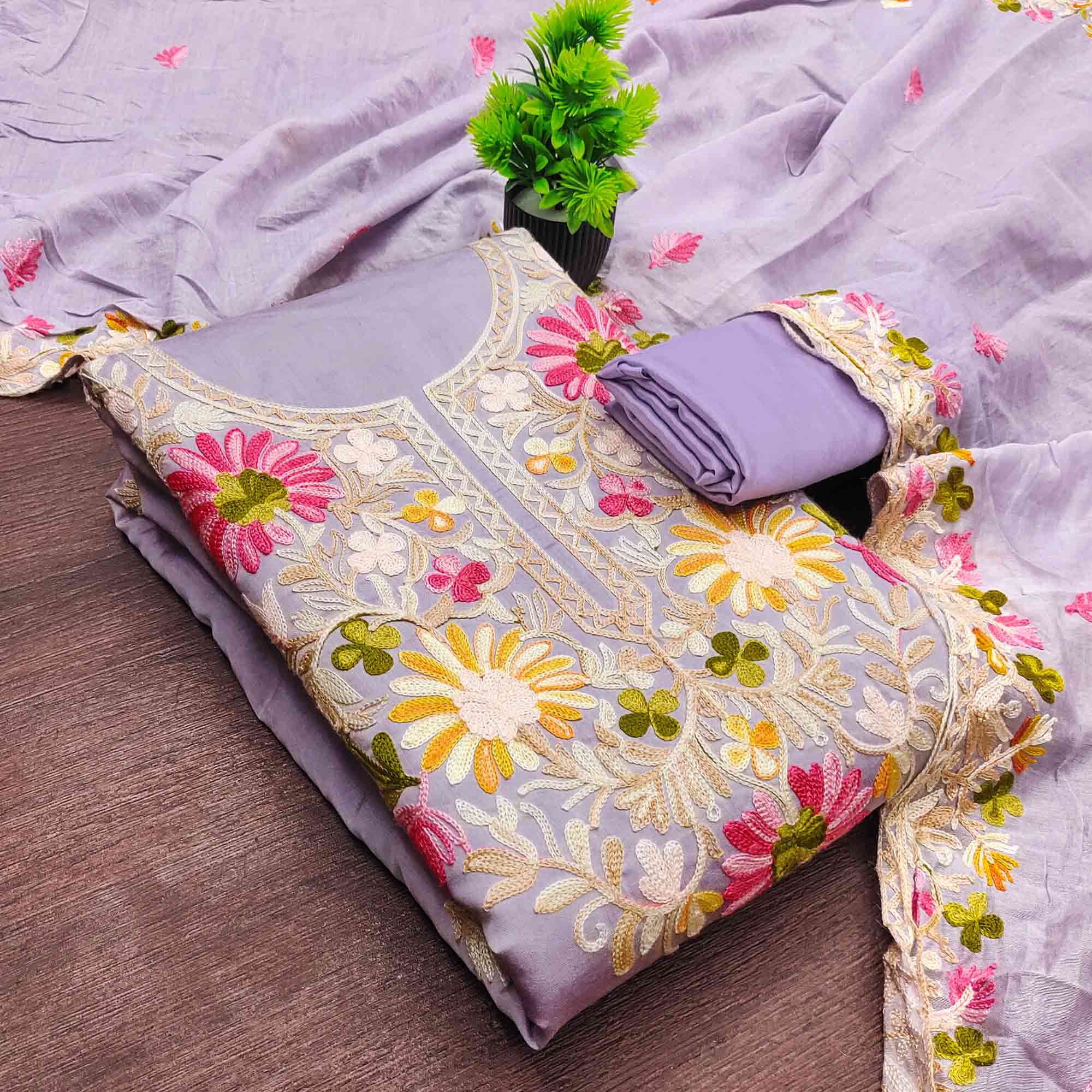 Lavender Designer Roman Art Silk Dress Material Adorned With Floral Thread Embroidery Work